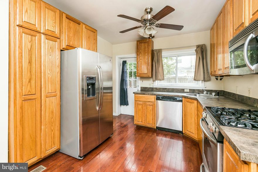 Steps from everything Federal Hill has to offer! This 2 bedroom, 1 bathroom home features hardwood floors throughout, tall ceilings, stainless steel appliances, open floor plan, bathroom with dual vanity sink, and washer/dryer in basement. Nice quiet block with street parking nearby. The church on the end of block is under contract for redevelopment. Easy access to shopping, nightlife and hwys.