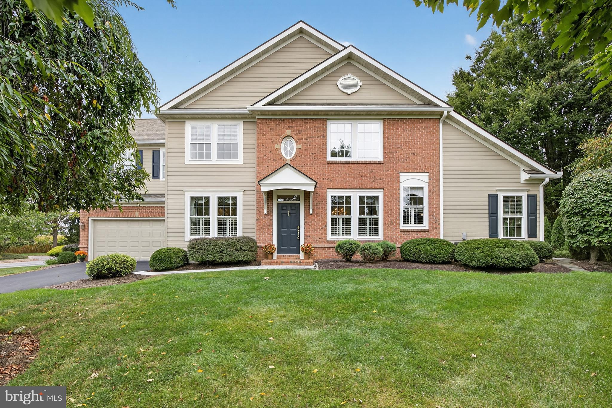 Welcome to this refined 3-bedroom, 2.5-bathroom condo in Bent Creek’s Northfield II community, where thoughtful open-concept design and timeless details create an inviting atmosphere. Step through the front door into a dramatic foyer/dining room with a soaring two-story ceiling, adorned with double crown molding, a statement chandelier medallion, and abundant natural light. The adjacent living room exudes comfort with plush carpeting, crown molding, and large windows, while the kitchen serves as the heart of the home with its spacious granite-topped center island, stainless steel GE refrigerator & dishwasher, electric cooktop, wall oven, and ample space for a kitchen table. Just off the kitchen, the back patio offers the perfect setting for morning coffee or intimate gatherings. The first-floor primary suite provides a true retreat with its high tray ceiling with elegant crown molding accents, tall windows, and spa-like ensuite featuring a dual sink vanity, walk-in shower, and generous walk-in closet. Upstairs, a versatile loft with decorative columns and arched openings overlooks the main level, creating an open and airy flow. Two comfortable bedrooms and a shared full bath with tub/shower combination complete this level. Additional highlights include an oversized two-car garage, crawl spaces for extra storage space, attractive landscaping, and a location just moments from boutique shopping in Lititz and the vibrant attractions of Downtown Lancaster. Whether you're interested in golf, tennis, swimming, or social activities, there are various Bent Creek membership options available to suit you. This home seamlessly blends sophistication, comfort, and convenience in one beautiful package. Schedule a private showing today!