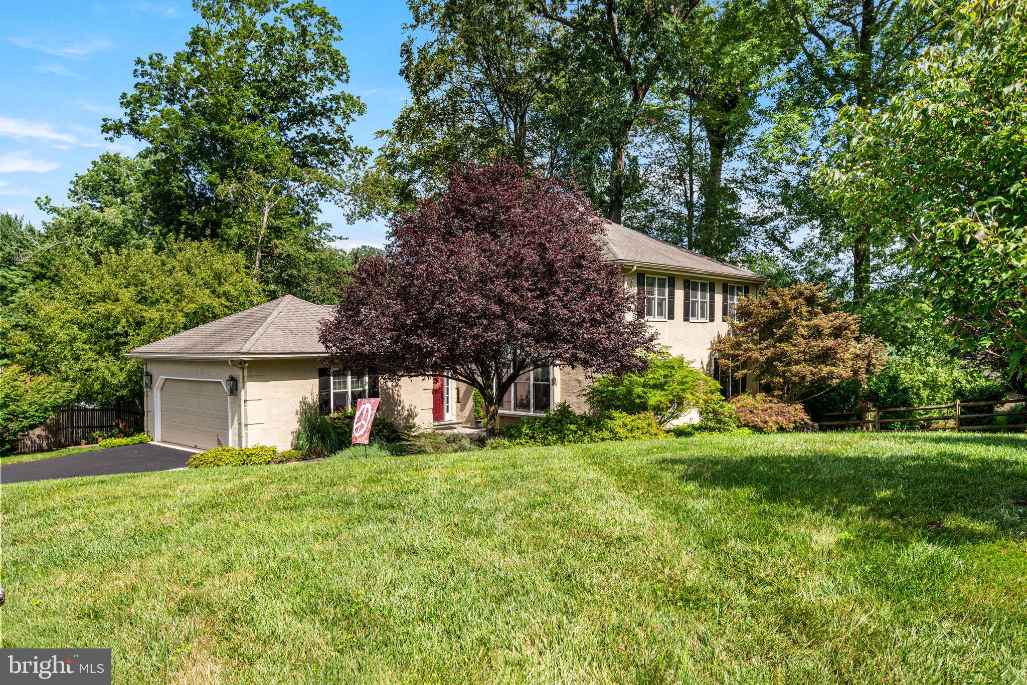 Fantastic opportunity to own this beautiful, well maintained and updated French colonial home on a corner lot in the community of Runnymeade Farms in Rose Tree Media school district! This home features 4 spacious bedrooms, 2 full and 2 half baths, a convenient 1st floor laundry room, and a walk-out finished daylight lower level with a home office and storage, all in a private and peaceful setting with a wrap around deck, rear yard, and secluded patio! Beautiful hardwood floors span most of the first floor in the center hall, living and dining rooms, kitchen, family room and powder room and tasteful tile floors are in the entrance foyer and laundry room. The living room is sprawling and features crown mouldings, a triple picture window, an oversized double window and flows through a wide cased opening into the dining room with lovely wainscoting, crown mouldings, and a French door to the kitchen. The kitchen is centrally located and has been updated to include new cabinetry, appliances, Quartz countertops, recessed lighting, a spacious breakfast area with door to the deck, charming decorative windows including a window seat, pocket doors to the family room, and access to the lower level. The fireside family room is also spacious with a wall of brick surround, wood mantle, glass doors, and raised brick hearth that you can sit on with wood storage carved out. There is also a large sliding glass door to the deck with picturesque views, offering peaceful serene setting, and it’s even a hair cooler in temperature! A rear foyer houses the powder room with decorative sink, step down laundry room with additional sink, access to the attached garage, and French doors to the center hall and front foyer with a coat closet. Hardwood stairs with white risers lead to the upper level with hardwood floors in the hall and spacious primary suite. The primary bedroom is complete with an ensuite bathroom with double sink, delightful soaking tub, double window with plantation shutters, walk-in shower with seamless glass doors, commode area, and a large walk-in closet. The remaining 3 bedrooms boast new carpeting and spacious closets with lighting. This level is complete with the hall bathroom offering beautiful cabinetry, an accent window, and a shower/tub combination with floor-to-ceiling tile surround. The lower level of this home offers incredible bonus space with new luxury vinyl flooring, a second powder room, a second family room or play area, an additional game area, separate office, and large storage space! This home sits on a large corner lot and the exterior includes a wrap around deck with steps down to the private rear yard as well as a neat patio area. The community offers many amenities including a pavilion, swimming pool, tennis and pickleball courts, and walking trails. There are many community events around the holidays including movie nights, Easter bunny egg hunt, trunk or treat for Halloween, and Santa comes around Christmas time! The HOA fee is only $400/year.! The home is conveniently located close to Whole Foods, Ruth's Chris, Sedona restaurant and all the other wonderful attractions of Ellis Preserve. Don’t miss this opportunity to get into a fabulous move-in ready home in a wonderful community!