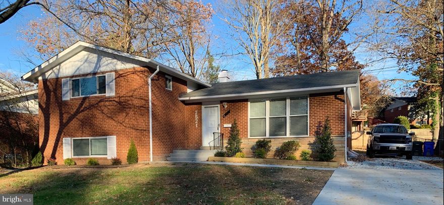 Top to bottom, inside/out renovation!  Live close to the action and in style! Well kept 4 level split with 4 bedrooms, 2.5 baths, all renovated, Open floor plan with recessed lights, all black stainless steel high end appliances, silo stone counter tops, refinished hardwood floors, new cabinets, 3 bedroom in uppermost level, master bedrooms with walk-in closet, Huge rec room with 1/2 bath, washer and dryer, wet bar, new replaced water heater, huge basement with bonus room feature a very large walk-in closet.  New driveway, back patio, all new windows, hardscaped and just an overall great property.  Short bike ride to metro, walk to lake and trails, historic airport within walking distance and the great amenities college park has to offer which include fine dining and entertainment!