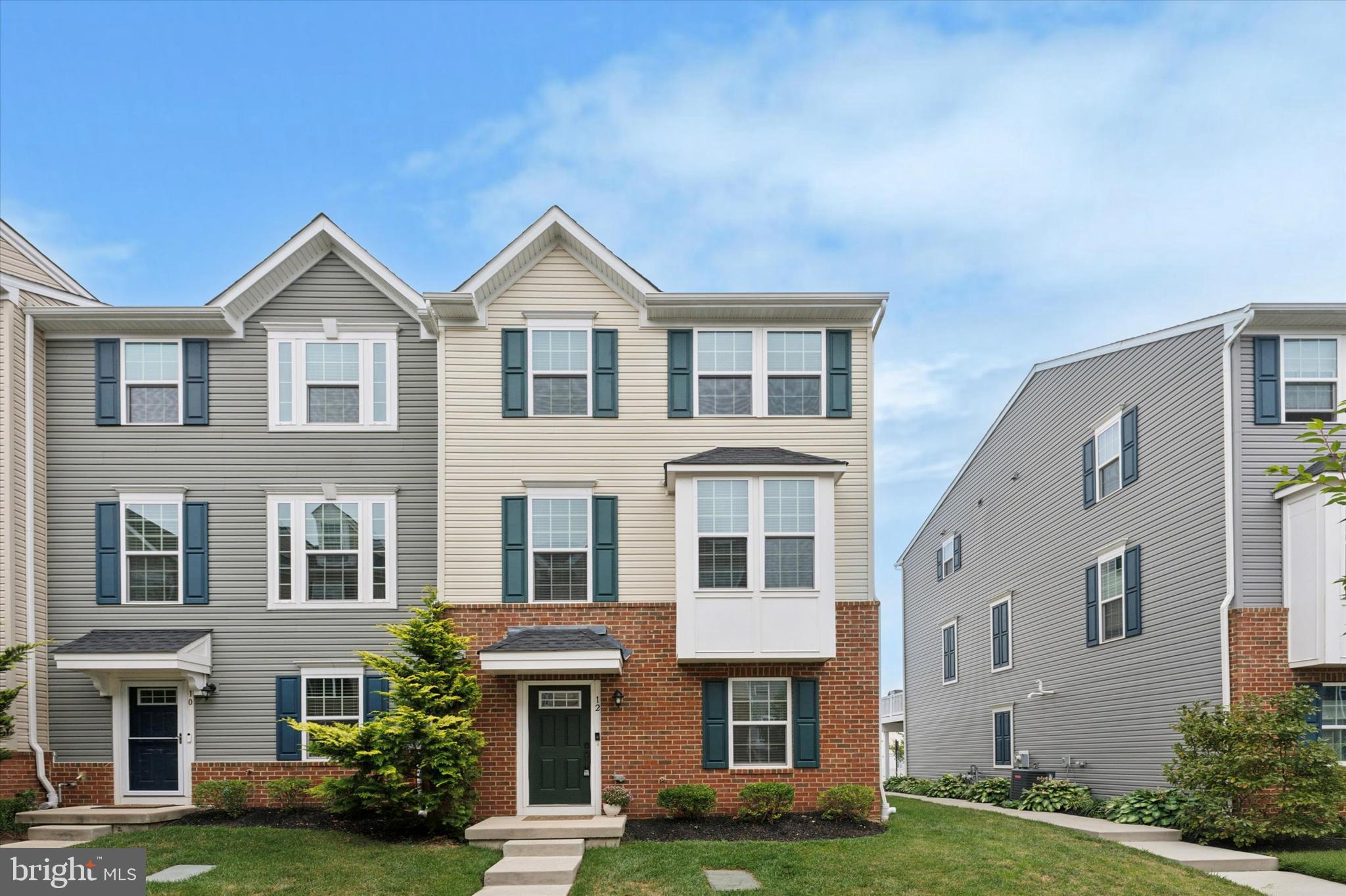 Welcome to 12 Sherman Alley in The Square at West Chester! This 6-year-young end-unit townhome offers the perfect blend of style, comfort, and convenience—truly move-in ready with fresh paint throughout some of the rooms. The entry level features a versatile layout with a powder room, storage area, and a private office or second living room, enhanced by elegant 12-panel glass french doors. Parking is effortless with a 2-car garage plus 2 additional driveway spaces.
The main living level has a bright, open-concept design ideal for both entertaining and everyday living. The family room flows into the dining area and the eat-in kitchen, which showcases an oversized island with seating for four, pendant lighting, granite countertops, tile backsplash, and crisp white cabinetry. Recessed lighting throughout adds a modern touch. Step outside the slider to a low-maintenance composite deck overlooking a charming community park space. Upstairs, retreat to the spacious primary suite featuring recessed lighting, a large walk-in closet, and a spa-like bathroom with a soaking tub, tiled shower with seat, and dual vanity sinks. Two additional bedrooms; one with its own walk-in closet, plus a full hall bath and a convenient laundry area with cabinetry complete this level.
Experience the vibrant lifestyle of West Chester boro, with its festivals, boutiques, restaurants, hotels, and bars, all within walking distance from this exceptional community. This community also offers open space for residents to enjoy, perfect for outdoor activities or relaxing outside. Plus, community get-togethers and parties provide opportunities to connect with neighbors and build lasting friendships. Don't miss the opportunity to make this well maintained townhome your own—schedule your tour today and experience the best of West Chester living!