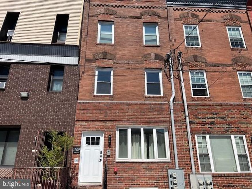 Welcome to this charming 3-bedroom, 1.5-bath second-floor unit, ideally situated in the heart of South Philadelphia. This thoughtfully updated home features modern LifeProof flooring throughout, providing durability and style. The spacious kitchen is fully upgraded and ready for your culinary creations. Enjoy the convenience of both a full and half bath, as well as access to a private rear deck, perfect for relaxing or entertaining. With additional yard space, this unit offers a perfect blend of comfort and urban living.