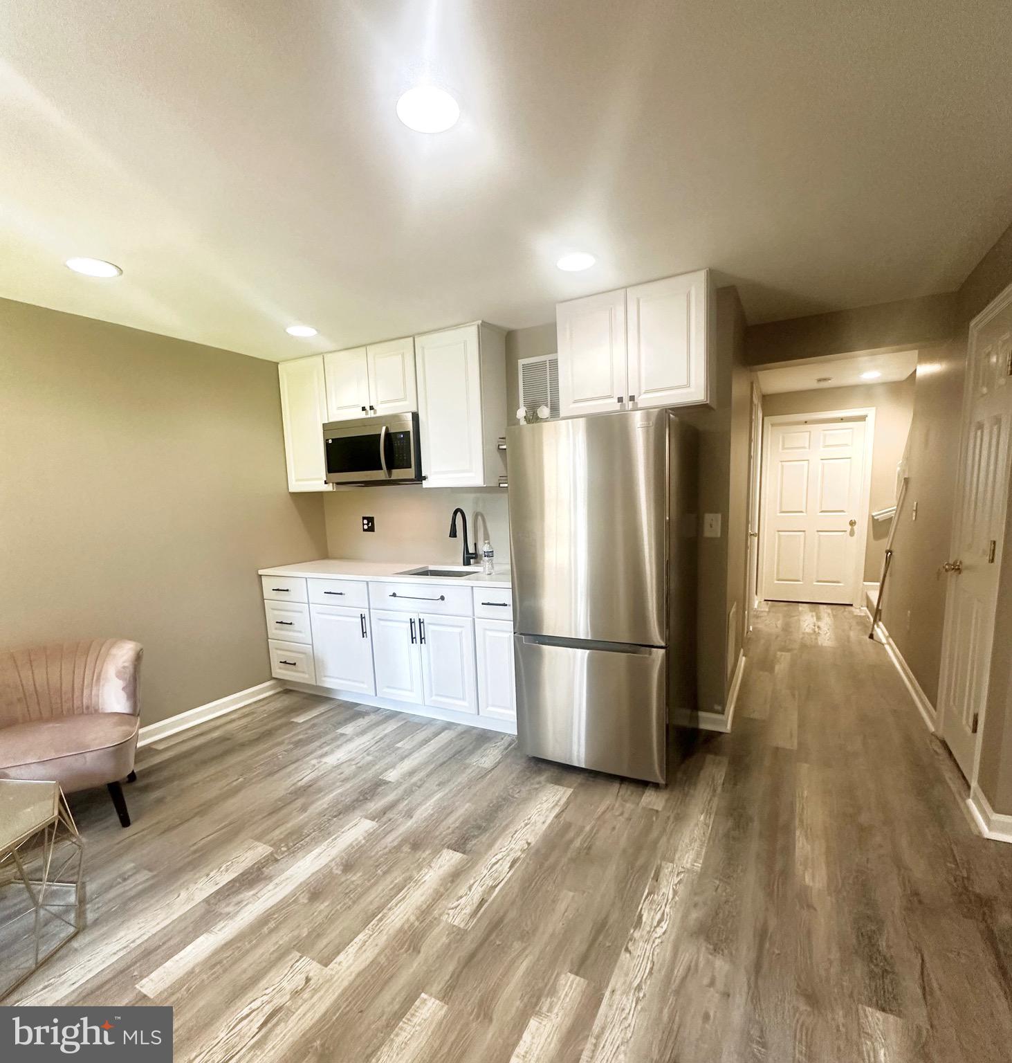 This basement is truly a dream space. It features upgraded luxury vinyl flooring throughout, a brand-new kitchenette ideal for one or two people, and a spacious full bathroom with a modern stand-up shower. The bedroom comfortably fits a queen-sized bed with room to spare.
Enjoy the convenience of in-house laundry and a completely private entrance, separate from the main unit above. You'll also have your own private backyard perfect for relaxing, enjoying fresh air, or creating a cozy outdoor space of your own.
Included in the rent are all utilities, free Wi-Fi, and a dedicated parking spot.
Located within walking distance of Leesburg Outlet Mall, Home Depot, HomeGoods, Trader Joe's, Crunch Fitness, and many more shopping and dining options everything you need is just steps away.
Come see it for yourself and fall in love with the neighborhood and the warm, welcoming energy this place has to offer.