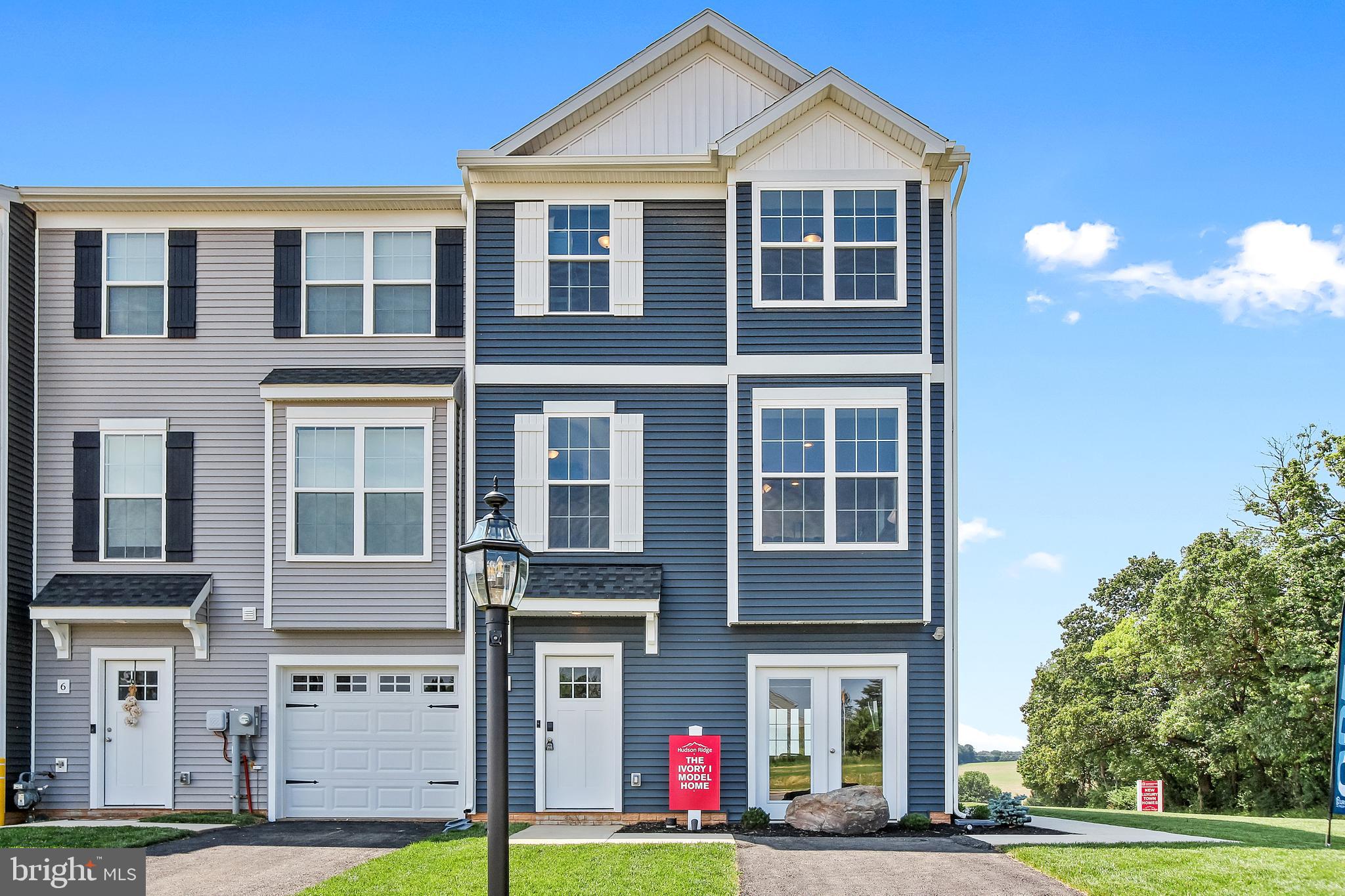 Move-in 60-90 days! Affordable brand new construction townhome located in Red Lion featuring up to 1900 SQFT.  Offering a low maintenance lifestyle, our homes include one car garage with 3 bedrooms/2.5 bathrooms located just minutes away from great outdoor activities, as well as the area's top-ranking school districts. Centrally located, Red Lion is an ideal location for those commuting to the major Maryland metropolitan areas in Baltimore and Washington, as well as the York and Harrisburg areas. On the main living level of this Interior home, it welcomes you to an enormous Kitchen featuring shaker White cabinets, granite countertops, and stainless steel appliances with an island. The Kitchen opens onto a bright and airy Living Room, perfect for entertaining featuring upgrade lighting fixtures and low-maintenance flooring. Upstairs are two spacious bedrooms with ample closet space, a hall bath, upper-level Laundry, a generous Owner's Bedroom with a tray ceiling, a huge walk-in closet, and an En Suite bathroom with granite countertops and shaker cabinets. On the Entry-level you will have the convenience of a powder room and finished recreation room that will walk out to your yard.