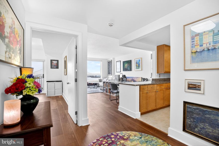 EASY LIVING AT ITS BEST: WELCOME TO THE RESIDENCE AT DOCKSIDE! INTRODUCING UNIT 916: North-facing, open, spacious, and beautifully upgraded one-bedroom condominium offering private parking, the option for two storage units, stunning, top-of-the-line 7.5-inch solid Triangulo Brazilian teak hardwood floors, and truly unmatched panoramic views of the water, Center City skyline, and Penn’s Landing.

Enter into a sizable foyer that leads to a spacious, well-equipped, eat-in kitchen featuring abundant 42” cabinetry, granite countertops, and a large breakfast island, perfect for entertaining. The bright and airy living and dining area showcases top-of-the-line ¾” thick, 7.5” wide solid Brazilian teak hardwood floors throughout and is highlighted by an entire wall of floor-to-ceiling windows capturing breathtaking views. A sliding door provides direct access to a private deck, ideal for relaxing or entertaining.

The spacious bedroom offers continued hardwood flooring, a large walk-in closet with additional storage, and its own sliding door to the private deck. The full tile bathroom is generously sized and conveniently includes a washer and dryer.

This exceptional unit features numerous upgrades and is complemented by one-car private parking and the option to have two sizable storage units, a rare offering in this building, please call for more details on the storage units.

About the Building: The Residence at Dockside: The Best of the Best: featuring: 24/7 concierge, Reserved Owner and Guest secured Parking, Award-Winning World-Class Clubroom with a 4100 square -foot terrace with spectacular breath-taking waterfront views, state of the art fitness center, heated indoor swimming pool and a hot tub. Dockside also offers a private minibus daily for residence to and from Center City. Live just steps from the waterfront trail, parks, marinas, and some of Queen Village's best dining and coffee spots. Easy access to all major highways and bridges. Schedule your appointment today!