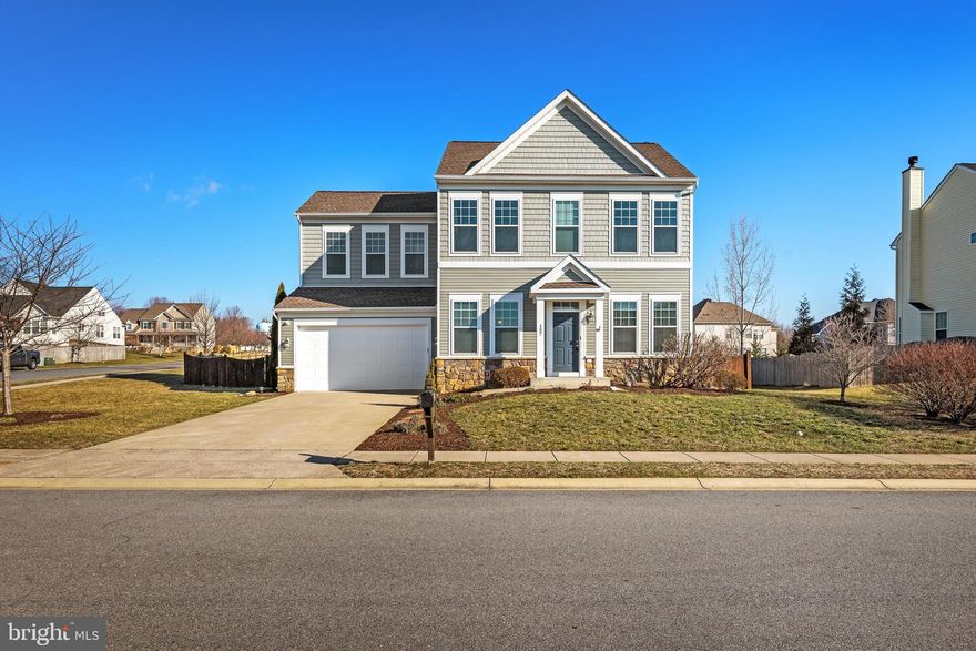 Beautifully maintained colonial home in Norborne-Glebe SD just off Route 340 and perfect location for commuters.  Features include 4 bedrooms on the upper level with 2 full baths and laundry room.  All bedrooms are spacious with large closets.  Main level features include formal dining room, formal living room or could be used as an office with beautiful built-in shelves.  Gourmet kitchen with breakfast area and open to the family room with wood burning fireplace.  Lower level features a finished rec room with theater projector and screen.  5th bedroom  and full bath and storage area.  Exterior features include fully fenced rear yard with deck and patio with firepit and underground sprinkler system.   Seller had carpet professional cleaned, HVAC recently serviced and chimney cleaned.  Community pool and clubhouse under construction and ready to open July 2024!