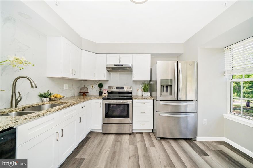 Rare find! Stunning beautifully renovated 3-level garage townhome in sought-after Forestville Park. This spacious 3-bedroom, 2-full-bath, 2-half-bath home shines with new waterproof flooring throughout, a stylish oversized updated kitchen with a large box window, granite countertops, white shaker cabinets, and stainless steel appliances. The beautifully renovated bathrooms feature tiled showers, new vanities, updated lighting, and new toilets. The cathedral ceiling in the primary bedroom creates a bright, open, and airy retreat. The finished lower level with a half bath offers the perfect flex space for a home office, gym, media room, or rec room. Enjoy the convenience of an attached 1-car garage plus plenty of nearby visitor parking. Fantastic location just minutes to the D.C. line, Northwest Stadium, the Prince George’s County Sports & Learning Complex, I-495, and Route 202. Garage townhomes in this neighborhood are exceptionally hard to find. Hurry up! This move-in ready home will not last long!