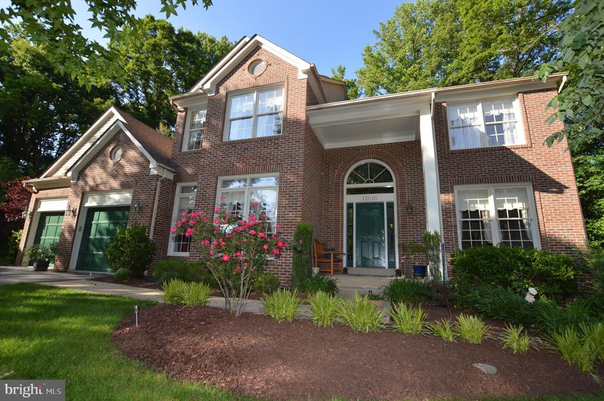 OFFER DEADLINE: June 20th @ 6pm. Limited edition Michael T. Rose home in the most desirable lake entrance section of the Northridge community. This brick-front 5-bedroom/3.5-bathroom home sits on a huge 37,000 square foot lot at the end of a cul-de-sac. Step into the spacious two-story grand foyer and greet your guest in a large open but inviting space with traditional living and formal dining rooms on each side. The oversized family room with an eye-catching semi-circular wall of twenty-seven windows has a double-sided floor-to-ceiling rocked fireplace. Adjacent to the fireplace sits the kitchen/eat-in dining area with more views of this large wooded landscaped lot. There is a butler’s pantry situated between the kitchen and formal dining room as well. On this main level you will also find a large and truly functional laundry room with six built-in cabinets and a full-size window. Completing the main level is a large office with built-in cabinetry and three large windows to bring in the nature of the outdoors and provide a relaxing place to telework. This home is great for outdoor living/entertaining with a large deck, connecting bridge to gazebo/built-in seating and staircase to the patio and putting green. Absolutely gorgeous landscaping surrounds the sides and rear of the home with paths through the wooded backyard to a small stream. The backyard with fully mature trees and hillside shrubs/flowers offers complete privacy. The basement extending into the backyard has all the entertainment you will need. Play a game of pool, watch the latest blockbuster movie, go outside to practice your putting game, or simply relax on the deck/patio. The upstairs features a large primary bedroom and a large soaking tub and separate shower in the bathroom. There are three large guest bedrooms and one guest bathroom on this level. The walkout basement is spacious and light filled with a semi-circular wall of nine brand new casement windows and a sliding patio door. The basement also features an enormous guest bedroom which can easily accommodate a king-size bed along with one full-size window and a full bathroom. Two other rooms completing the basement; an unfished storage/utility room area and a large unfinished room you can finish off as well with two full-size windows and a door to the patio.  All doors on the basement level are 36" wide for wheelchair access. The Northridge community has the following amenities: Northridge Lake, gazebos, trails, tennis courts, swimming pool, swimming club, tot lots, ball fields and a rentable recreation center. Visit this rarely available dream home today and stay to enjoy everything Northridge has to offer!