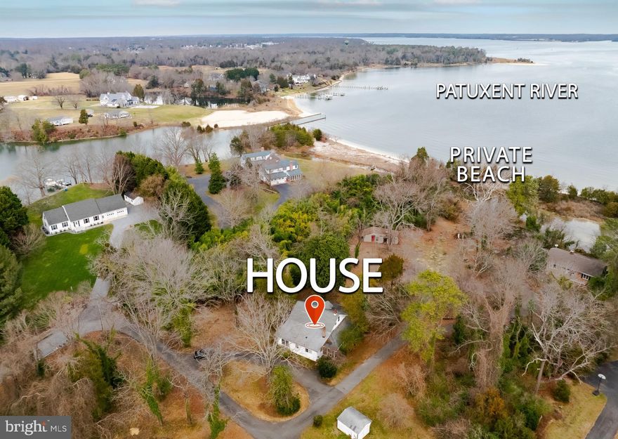A rare opportunity to own a waterfront retreat on the Patuxent River. This charming beach bungalow is uniquely positioned with a private footbridge over a serene creek, leading directly to your own sandy beach—an exceptional setting that is seldom available. The home offers rehab potential; however, the true value lies in the land and its riverfront location. Whether you envision restoring the existing structure or creating a custom coastal getaway, the possibilities are endless. Property is being sold STRICTLY AS IS. Opportunities like this on the Patuxent River are few and far between, call to schedule a showing today!