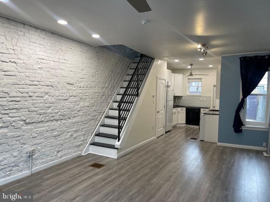 Live at 1313 S Taylor St, a beautifully renovated 3-bedroom, 2-bathroom home located near Wharton Square and just minutes from Center City Philadelphia. This modern home features stunning exposed brick, central air, and a thoughtfully designed open-concept layout. The updated kitchen includes stainless steel appliances, a dishwasher, and ample cabinet space. Enjoy the convenience of in-unit laundry and a fully finished basement, perfect for additional living space or storage. Step outside to a private backyard, ideal for relaxing or entertaining. Pets are welcome on a case-by-case basis.