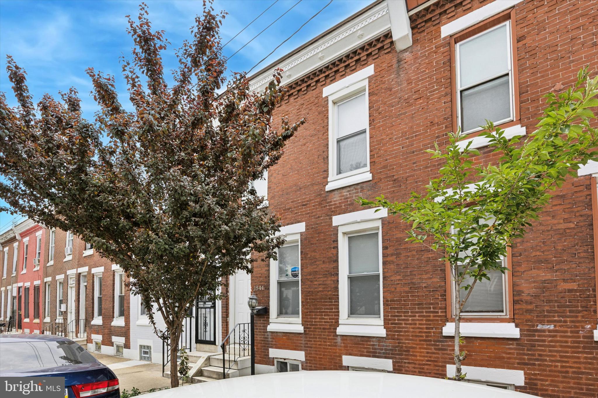 Welcome to 1844 E Clementine Street, a beautifully updated home combining charm and comfort. This well-maintained property boasts a classic brick façade, setting the tone for the quality updates throughout. Step through the vestibule into a bright and airy living and dining area featuring solid wood floors and stair treads. The renovated kitchen is a standout, with brand-new custom concrete countertops by local studio Craftwork Design, new stainless steel Energy Star appliances, and updated fixtures and finishes, perfect for both everyday living and entertaining. Beyond the kitchen, you’ll find a half bath, a laundry area with washer and dryer, and access to a south-facing rear yard with space for a grill, table, and chairs. Upstairs are three spacious bedrooms and a freshly updated main bath featuring a refinished tub, attractive basalt tile, and a custom concrete vanity and shelf. Enjoy a low-maintenance space with major recent upgrades, including newer windows, a recently serviced HVAC system, a new electric heat pump hot water heater (2022), and a new roof installed in 2021, all contributing to long-term efficiency and comfort. 1844 E Clementine has so much to offer - great for an owner-occupant or as an investment property. The neighboring property at 1842 E Clementine is also listed for sale by the same owner, offering a rare opportunity for side-by-side ownership. Come check it out!