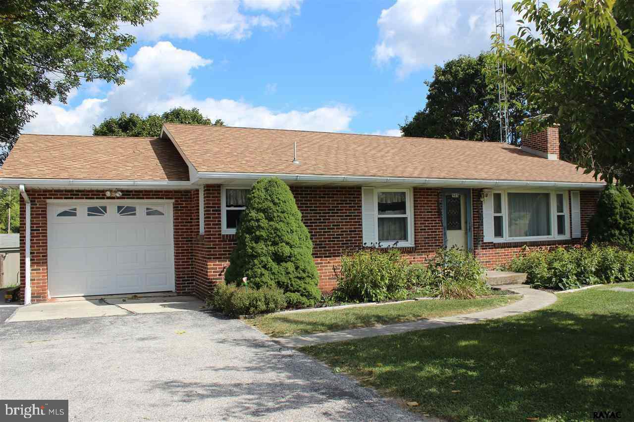 LOVELY PROPERTY WELL MAINTAINED WITH WOOD FLOORING * SIDE LOT IS INCLUDED IN SALE * LARGE PATIO 16 X 32 * LARGE STORAGE SHED * GORGEOUS KITCHEN * STONE FIREPLACE IN FAMILY ROOM * RECREATION ROOM DOWNSTAIRS * BEDROOMS HAVE WOOD FLOORING * UNDER CARPET IN FAMILY ROOM ALSO HAS WOOD FLOORING * FARMLAND BEHIND HOUSE * ALL BRICK HOME *