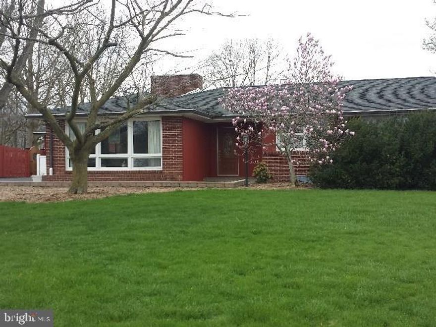 Sprawling ranch home offers spacious room sizes, hardwood flooring, 4 fireplaces (2 propane, 2 wood), renovated baths, all on 1.67 acres.  Lower level features refurbished rec room, wet bar, wine cellar and tons of storage.  You'll love the 3 season porch with rock wall fireplace, hot tub room off the master suite & brick patio with fountain, outdoor kitchen and fire pit area for gracious entertaining and comfortable family living.