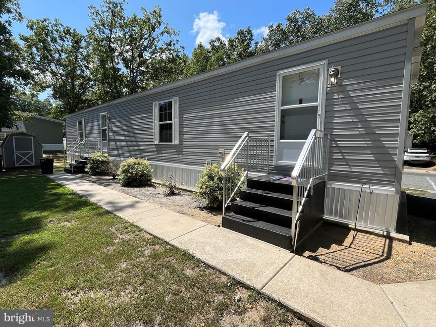 Price Improvement!!! Call today!
Charming 2-Bedroom/2-Bath Corner Lot Mobile Home in Desirable Fair View Manor Community.

Welcome to 2110 Mays Landing Road, #34, Millville, NJ—a delightful 2-bedroom, 2-bath mobile home nestled in a quiet and friendly community. This well-maintained home offers a comfortable and affordable living option with a spacious layout designed for ease and convenience.

Key Features:
Open Living Space: The home boasts a bright and airy living room with ample natural light, perfect for relaxation and entertainment.

Modern Kitchen: Enjoy cooking in the well-appointed kitchen featuring plenty of cabinet space, a built-in microwave, dishwasher, stove, and refrigerator.

Comfortable Bedrooms: The two bedrooms are generously sized, providing a peaceful retreat at the end of the day. Enjoy the primary bedroom with an ensuite and walk-in closet.

Bathroom: A clean and modern bathroom with a tub/shower combination.

Outdoor Living: Enjoy your morning coffee or unwind in the evenings in your spacious yard that offers plenty of greenery and space for outdoor activities. There is also a nice shed to help you tidy up.

Community Perks: Located in a well-kept mobile home park with amenities including a pool, on-site management, and easy access to shopping, dining, and recreational facilities.

Convenient Location: Situated close to major highways, making commutes to nearby cities like Vineland and Atlantic City a breeze.
 
This home is perfect for those seeking a low-maintenance lifestyle in a welcoming community. Don’t miss the opportunity to make 2110 Mays Landing Road, #34 your new address. Schedule a viewing today!
*Subject to park approval.