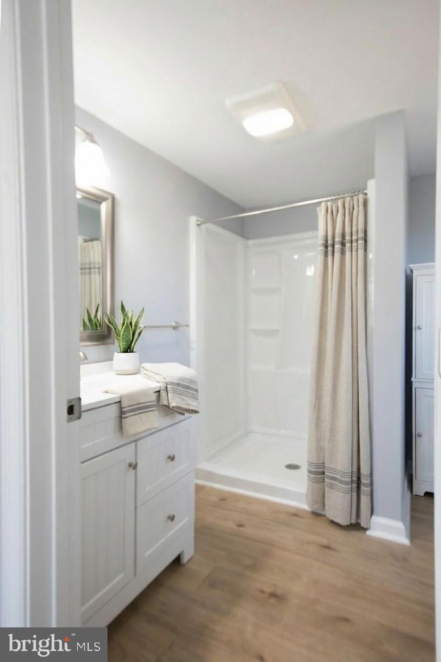 Welcome to life in Rock Hall — a charming waterfront town where the pace is slower, the people are friendlier, and the Chesapeake Bay lifestyle is part of everyday living. 
*SELLER ASSISTANCE AVAILABLE TOWARDS CLOSING COSTS*

This lovingly renovated home was thoughtfully updated by owners who cared about the details—not a quick flip—resulting in a property full of character and quality improvements throughout. Inside, you’ll find beautiful LVP flooring, a bright open-concept layout, and a stunning kitchen featuring granite countertops, a tile backsplash, stainless steel appliances, and plenty of space to gather after a day on the water, experiencing Chestertown and all the other towns nearby! Owner had a pre home inspection for your convenance! The home is good to go!

For peace of mind, all major systems are new, including a brand-new roof, and a home inspection has already been completed with items addressed, making this home truly move-in ready.

The layout offers comfort and privacy with the primary suite tucked away on one side of the home, while the three additional bedrooms are located on the opposite side, perfect for maybe or a home office setup. The home is connected to public water and sewer, and also offers fiber internet, giving you modern convenience in a laid-back coastal setting.

Step outside and enjoy the freedom that comes with no restrictions—bring your boat, RV, or water toys, and if you’ve been dreaming of building a pole barn or workshop, you can do that here too.

Located just minutes from creeks, rivers, and the Chesapeake Bay, this home places you right in the heart of one of the Eastern Shore’s most beloved boating towns. Rock Hall may only have one traffic light, but it’s full of life—with marinas, waterfront restaurants, coffee shops, boutiques, ice cream stops, and a quaint downtown. The town hosts events throughout the year, creating that true small-town vibe where everyone knows your name—or soon will.

If you’ve been searching for a fun, beachy lifestyle with small-town charm, modern updates, and room for your boats and hobbies, this home delivers.

Rock Hall — where nice people live.
*some photos have been enhanced with virtual staging*