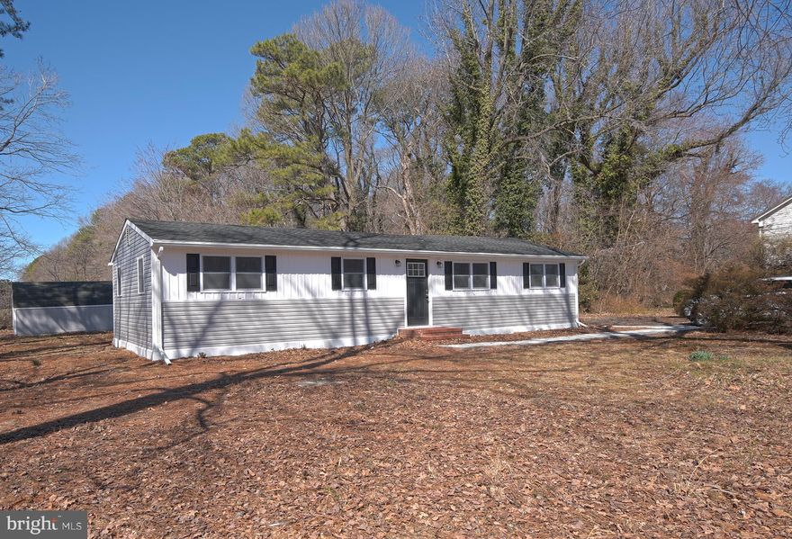 Welcome to life in Rock Hall — a charming waterfront town where the pace is slower, the people are friendlier, and the Chesapeake Bay lifestyle is part of everyday living. 
*SELLER ASSISTANCE AVAILABLE TOWARDS CLOSING COSTS*

This lovingly renovated home was thoughtfully updated by owners who cared about the details—not a quick flip—resulting in a property full of character and quality improvements throughout. Inside, you’ll find beautiful LVP flooring, a bright open-concept layout, and a stunning kitchen featuring granite countertops, a tile backsplash, stainless steel appliances, and plenty of space to gather after a day on the water, experiencing Chestertown and all the other towns nearby! Owner had a pre home inspection for your convenance! The home is good to go!

For peace of mind, all major systems are new, including a brand-new roof, and a home inspection has already been completed with items addressed, making this home truly move-in ready.

The layout offers comfort and privacy with the primary suite tucked away on one side of the home, while the three additional bedrooms are located on the opposite side, perfect for maybe or a home office setup. The home is connected to public water and sewer, and also offers fiber internet, giving you modern convenience in a laid-back coastal setting.

Step outside and enjoy the freedom that comes with no restrictions—bring your boat, RV, or water toys, and if you’ve been dreaming of building a pole barn or workshop, you can do that here too.

Located just minutes from creeks, rivers, and the Chesapeake Bay, this home places you right in the heart of one of the Eastern Shore’s most beloved boating towns. Rock Hall may only have one traffic light, but it’s full of life—with marinas, waterfront restaurants, coffee shops, boutiques, ice cream stops, and a quaint downtown. The town hosts events throughout the year, creating that true small-town vibe where everyone knows your name—or soon will.

If you’ve been searching for a fun, beachy lifestyle with small-town charm, modern updates, and room for your boats and hobbies, this home delivers.

Rock Hall — where nice people live.
*some photos have been enhanced with virtual staging*