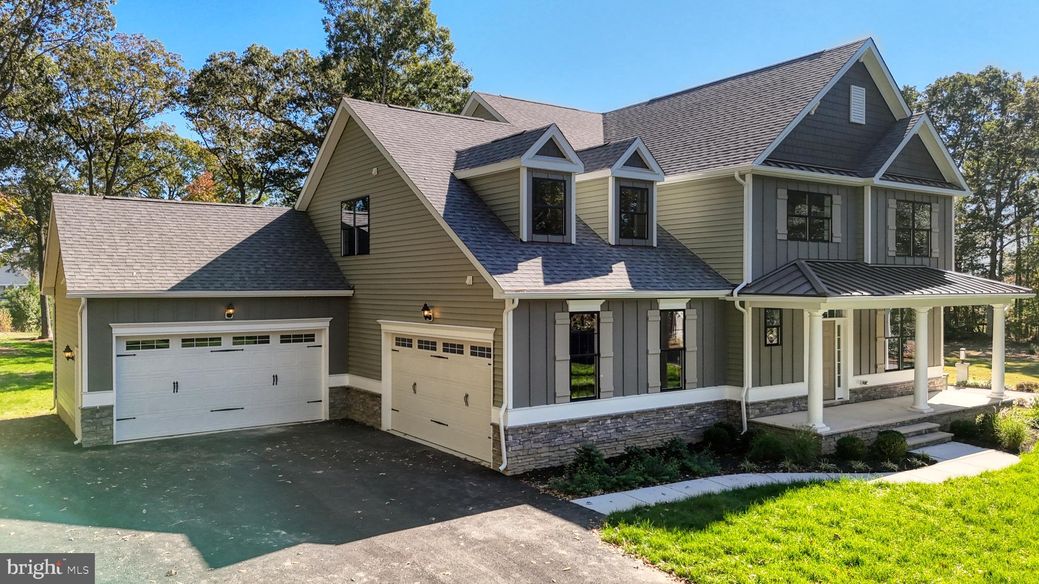 NEW CONSTRUCTION - Ready Now! Spacious 5-Bedroom Home with 4-Car Garage and Serene Pond Views – Rehoboth, DE
Welcome to this beautifully appointed 5-bedroom, 4-bathroom home located in one of Rehoboth’s most desirable communities. Nestled on a premium lot with tranquil pond views, this residence offers the perfect blend of luxury, space, and comfort — just minutes from the beach, shopping, and dining.
Step inside to discover an open and inviting floor plan. The gourmet kitchen features granite countertops, stainless steel appliances, a large center island, and custom cabinetry—ideal for entertaining. The expansive living area boasts hardwood flooring, a cozy fireplace, and large windows that capture the stunning water views.
Retreat to the spacious primary suite with tray ceilings, a spa-like ensuite bathroom, and generous walk-in closet. Additional bedrooms are thoughtfully laid out for privacy and flexibility, perfect for guests, a home office, or multi-generational living.
Car enthusiasts and hobbyists will appreciate the rare 4-car garage, offering ample space for vehicles, storage, or workshop needs.
Outside, enjoy peaceful mornings or relaxing evenings on the patio overlooking the serene pond—a true outdoor sanctuary.
Whether you're seeking a year-round residence or a coastal retreat, this exceptional property offers luxury living with the natural beauty of Rehoboth as your backdrop.