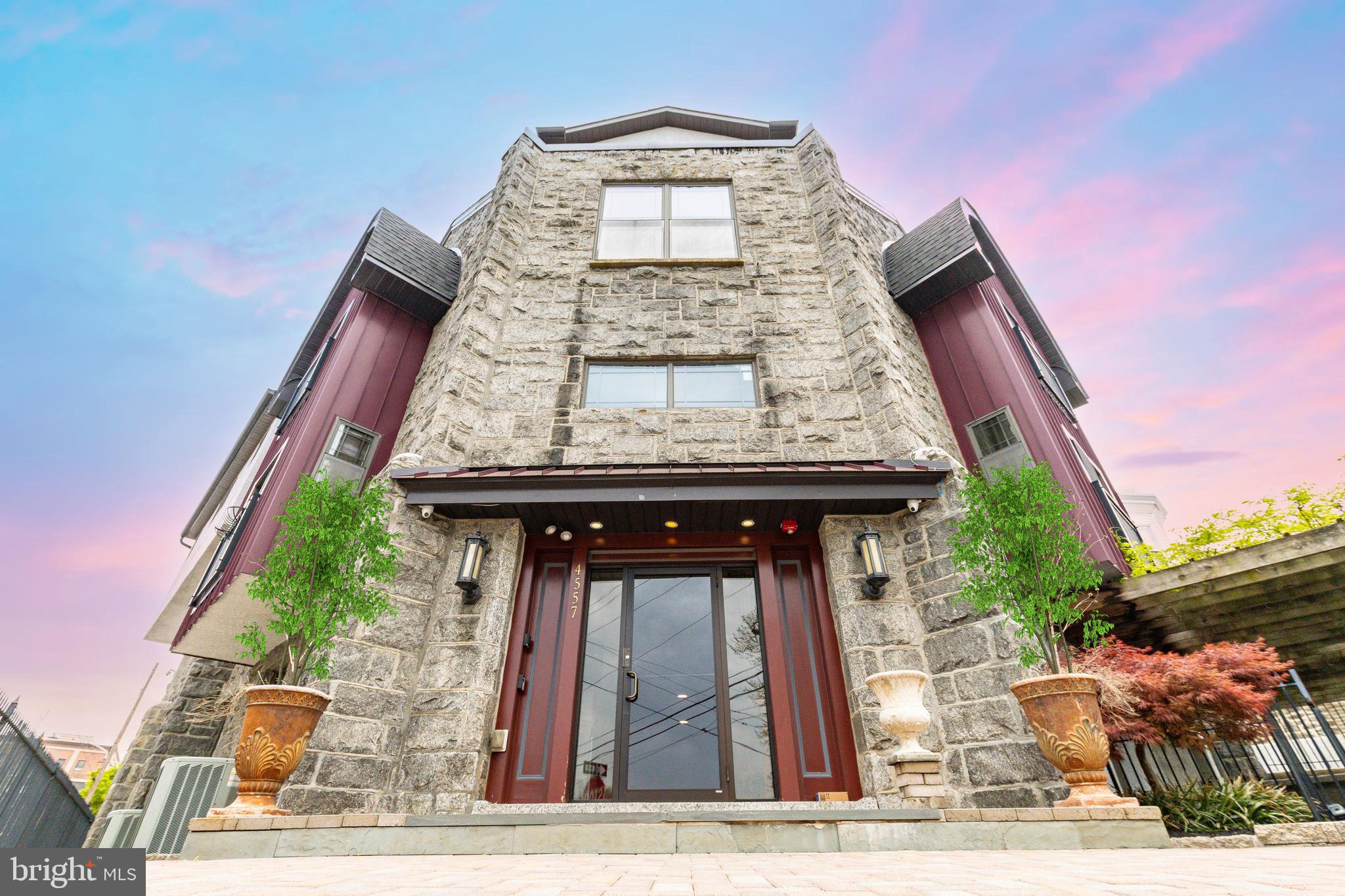 Cahill Arms Roxborough — this entirely unique multifamily investment property is loaded with original charm and modern conveniences and carries an 8.15% pro forma cap rate. With seven (7) 1-2-3 bedroom apartments and a 1:1 parking ratio (7-car driveway), this is a rare investment opportunity, now available in one of Philly's fastest growing submarkets. An ideal unit matrix is composed of: three (3) 3bd units, two (2) 2bd units, two (2) 1bd units — ensuring supreme rentability in every market cycle. The NWPHL (Northwest Philly) location is prime — easy access to Schuylkill River Trail, shops, cafes, restaurants and bars along Ridge Avenue corridor, as well as the Main Street Manayunk district. This location is highly favored in the Greater Philadelphia rental marketplace as tenants seek out spacious and affordable rental accommodations in "semi-suburban" edge city locales — close enough to the urban core, yet tranquil enough for a laid-back/outdoorsy lifestyle. Easily accessible to all of Philadelphia's main arteries and districts, including I-76, I-476, City Avenue, Ridge Avenue, Main Street + Center City, University City, The Main Line, and the suburbs. The parcel commands attention with its prominent corner placement. The gated building is luxuriously laid out with spaciously oversized units, 10' ceilings, beautiful corridors, custom millwork, bi-level and tri-level units, french balconies, exposed Wissahickon schist (stone) and other high-end building material selections. As a multifamily investment property, ±70% rental upside exists for new Ownership to fill vacancies and reset existing rentals to market rate. Alternatively, there is a ±$1M delta between the bulk market price of each unit (to be sold separately as condos) if that exit path is preferred. The condo association is active. Enquire within for pro forma financials.