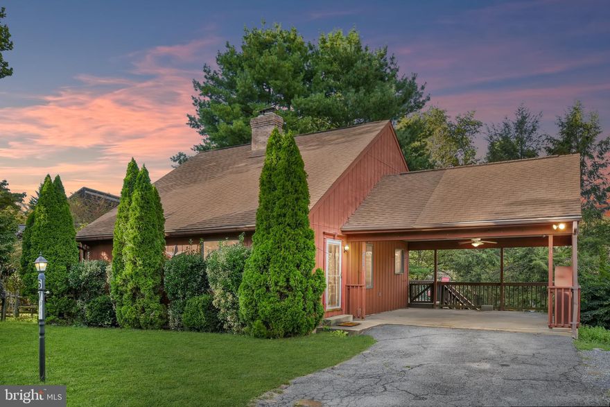 Located near the best that the Lake Linganore community has to offer, this lovely home offers walkability to community festivals and events. Enjoy the community swimming pools, beach and kayaking! And all in a great commuter location. Surrounded by mature trees and with a fenced, flat backyard--this is a great spot for entertaining or playing sports. With soaring ceilings and an open floorplan, this home features a large living area, cozy wood burning brick fireplace, kitchen with plenty of cabinetry and a walkout to a spacious deck where you can enjoy your morning coffee! The main level features a convenient bedroom and full bath. On the upper level, there are two additional bedrooms--both with access to a full bath. The lower level features a living area, full bath, laundry and extra storage.Walk up from the lower level to access the backyard.   Just add flooring to the main area of the lower level, and bring your finishing touches to this home! Don't miss this opportunity to own in Lake Linganore!