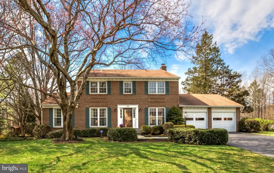 Handsome colonial on cul de sac street with Spring Hill Park at the end of street offering over 40 acres of parkland w/meandering streams, bridges and paths leading you to Spring Hill Rec Center * Spacious and light filled throughout * Large backyard backing to trees * Hardwoods on the main and upper levels * Walkout lower level w/nanny suite * Connector Bus at end of street to Silver Line Metro.