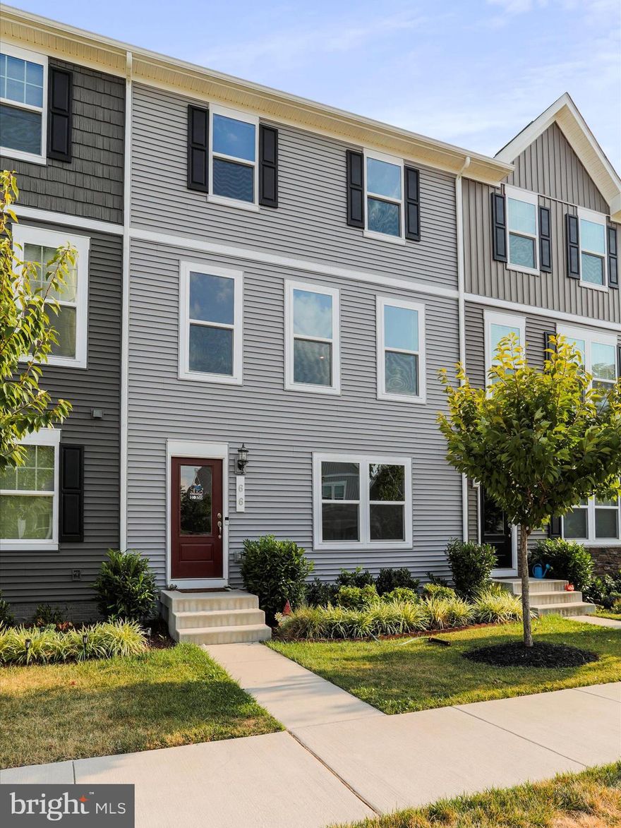 Welcome to this charming 3-bedroom, 2.5-bathroom home. This is the largest town house floorplan in the community. This modern gem is just 3 years old and boasts an open floor plan that invites natural light to dance through the space. Featuring stainless steel appliances, quartz countertops, a large island, and a dropped family room with 14 ft ceilings, this home is perfect for those who appreciate contemporary living. Enjoy off-street parking and a 2-car garage for your convenience. Situated close to shopping, dining, and major commute routes, this home is ideal for those seeking easy access to amenities and a smooth commute. Don't miss out on this fantastic opportunity to make this stylish property your own!