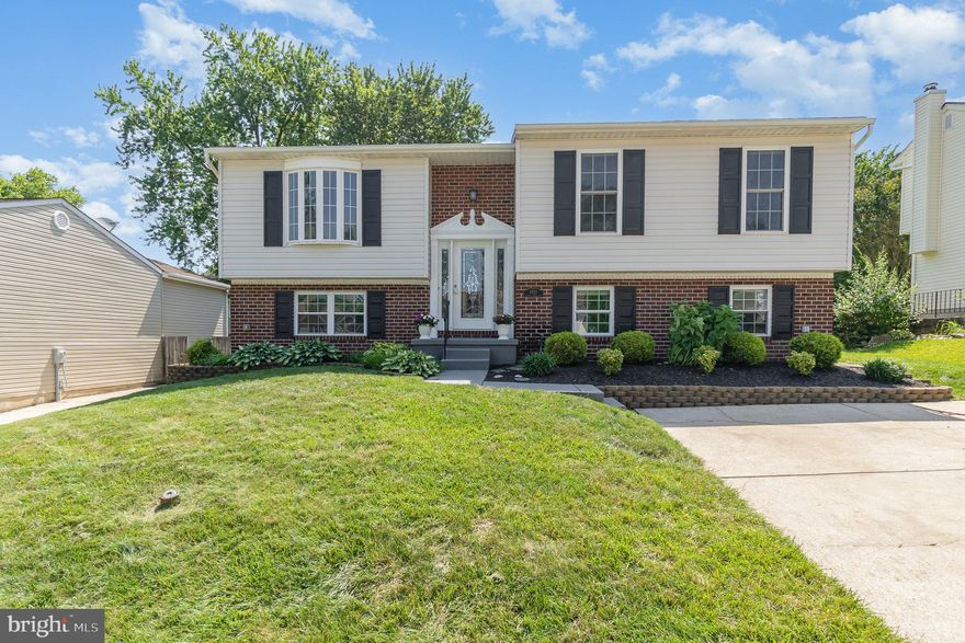 Welcome to 9523 Hickory Falls Way, a beautifully updated and energy-efficient home featuring LifeProof luxury vinyl flooring, full LED lighting, smart switches (Kasa), and a brand-new roof and vinyl siding. The eat-in kitchen offers granite counters, backsplash, stainless steel appliances, a gas stove, and under-cabinet smart lighting. The primary suite includes crown molding, fresh paint, and a fully tiled walk-in shower. Custom touches throughout include recessed TV boxes, upgraded closets, built-in shelving, and smart home features. The finished lower level has a fireplace, projector provisions, custom laundry area with dog bath, and luxury full bath and fourth bedroom. Outdoor living shines with a two-tier Trex deck, stone patio, LED step lights, and a powered shed for ample storage. There is double insulation and a Nest thermostat keep utility costs low. This home is move-in ready with modern updates in every room!