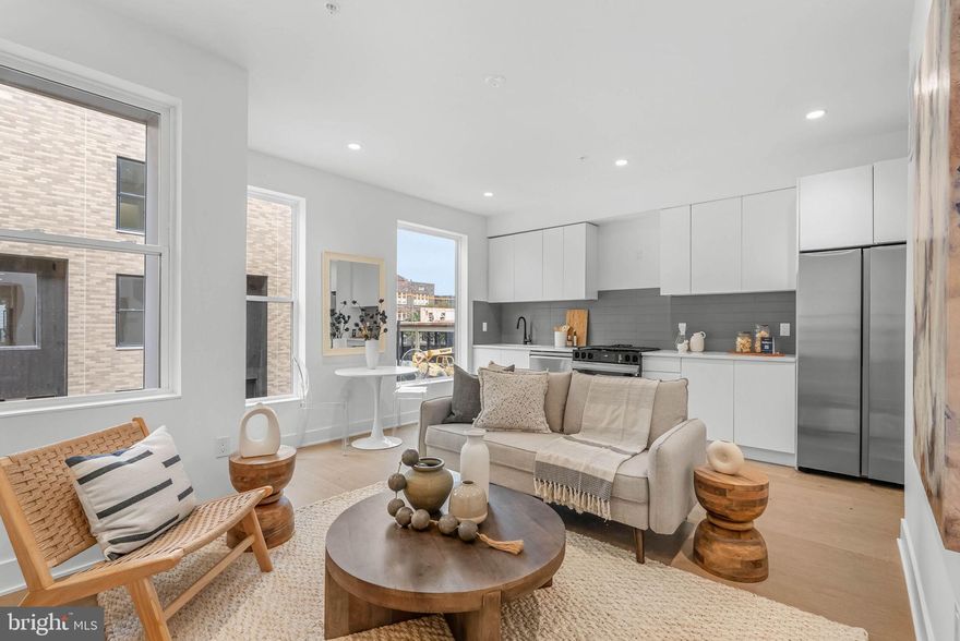 QUICK DELIVERY!! Most importantly this home has the ORIGINAL FULL 10 Year Tax Abatement, not the new graduated version. Enjoy double the savings in the 600 Fairmount Development. This home is over 1,600 square feet, with a shared garage, tax abatement and Porcelanosa finishes! 600 Fairmount is Philadelphia's brand new spectacular community ideally located at the SOUTH end of Northern Liberties, one block from Spring Garden Street! This eclection of homes vary from large single family townhomes to married townhomes and condominium-style residences all with access to garage parking. With its prominent location right off of Spring Garden, this unique enclave of homes is a convenient and fast commute to center city. The first phase of 600 Fairmount offers single family homes with various floor plans and price points available to fit your needs. The three bedroom homes include a finished basement and the first floor den could be turned into an office! Homes with private 1-2 car garage parking, expansive roof decks, and elevators are available. Most importantly, every home qualifies for the ORIGINAL full ten year tax abatement. Designed by Interface Studio Architects, every home has a unique facade that welcomes you to enter. Once inside, you'll discover a completely open main level with a living room and dining area filled with natural light from the huge windows. The stunning chef's kitchen decked out with GE Café appliances, custom Porcelanosa cabinetry and designer quartz, is sure to become the heart of the home! The lower level has a bedroom along with a full bath and laundry area as well as an additional storage room. The all-important 1-2 car garage parking and a large living area are on the upper level. The second level is where you will find the main living area + kitchen. The primary suite is your own private oasis. This space includes a massive bedroom with great natural light, large closets with space to share, and a luxurious bathroom outfitted with a double vanity, shower and commode. Be sure to review all plans to see all the amazing extras each home has to offer. The neighborhood is surrounded by massive sold out new construction projects. Nearby, Spring Garden, 4th Street, 3rd Street and 2nd Street are lined with local restaurants, shops, and markets. Fine dining, luxury shopping, and lively entertainment can be found in neighboring Spring Garden, plus Amazon Fresh a half block away, Target, Starbucks, Yards Brewery and much more are close by. The time is now to reserve your home, customize your finishes, and plant your roots for your next chapter. Square footage of 1,614 includes above and below grade. Taxes are not $1 and TBD. Taxes and square footage are the responsibility of the buyer to have verified. Photos are of the model home and for marketing purposes only and may not portray actual finishes. GPS Address - 600 Fairmount Avenue Philadelphia Pa 19123