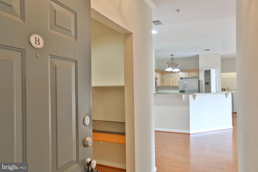 Main level unit with 2 bedrooms, 2 full baths. New hardwood floors, granite countertops & stainless steel appliances. Condo amenities include gated community, swimming pool, clubhouse, business center & gym. Easy access to routes: 28, 29, 50 & 66.