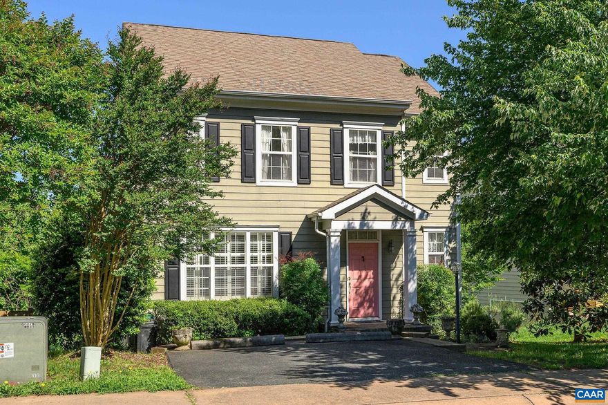 Nestled in a peaceful cul de sac just moments from historic downtown, this delightful home is full of character. Large windows flood the interior with natural light, creating a warm and inviting atmosphere. The layout flows seamlessly from one room to the next, with the living room featuring a cozy fireplace framed by built-in bookshelves. Adjacent to the living room are a formal dining room and a spacious eat-in kitchen. Upstairs, the primary suite is accompanied by two additional bedrooms and a bathroom. The full, unfinished terrace level offers walkout access. Enjoy the tranquility of a private deck with a pergola, overlooking a serene stream and lush greenery. Trane HTPUMP replaced August 2022.,Wood Cabinets,Fireplace in Living Room