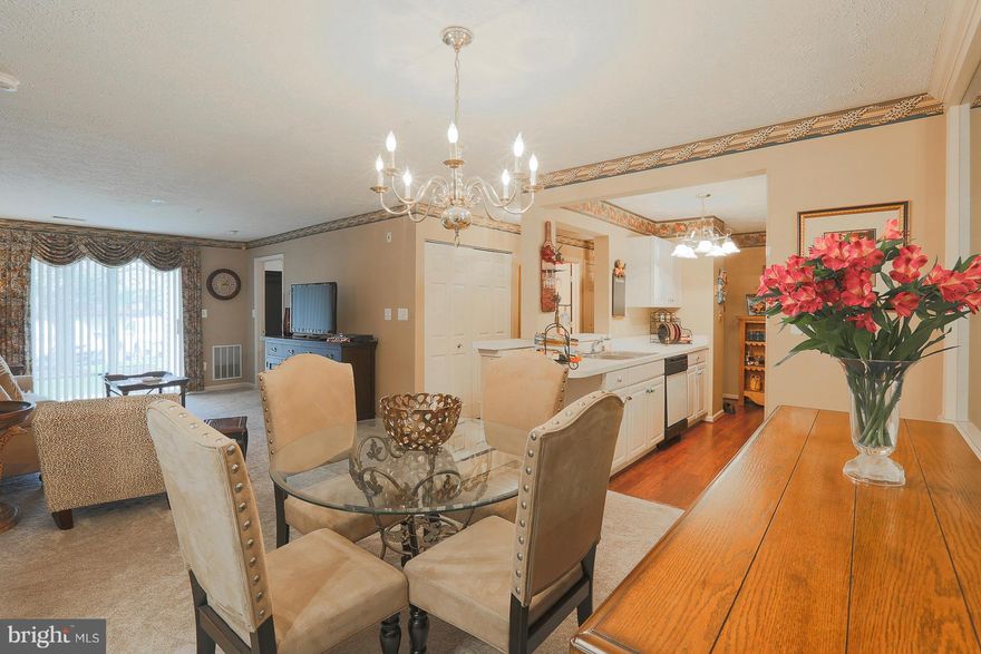 Magnificent 2 BD 2BA,Main level Builder's Model .NO STEPS. This classy condo features: Well appointed kitchen w/pull-out cabinets.LR has sliders to patio, DR w/ mirrored wall, custom wall and window treatments, generous sized bedrooms, MBA has walk-in shower & built-in seats. HVAC,hot water heater, washer dryer are NEW! Handicapped accessible wider doorways.Walk-in closets.HURRY!!