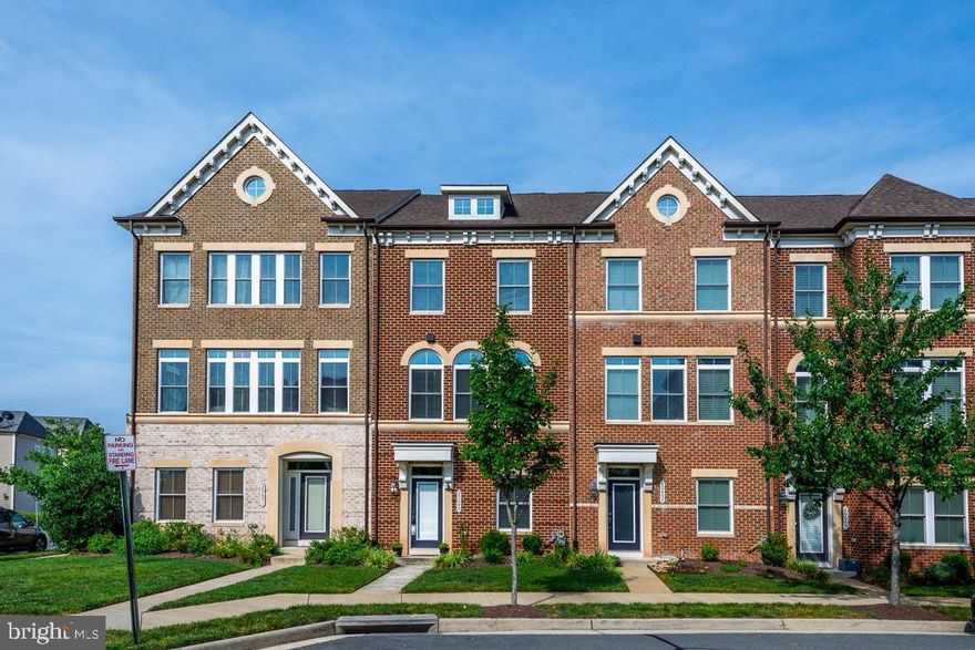 Available Now. This rarely available, FULLY FURNISHED 4-bedroom townhome offers the epitome of modern living in the heart of One Loudoun. Built in 2014, this stunning property is perfectly situated for both families and corporate rentals, with incredible walkability to the vibrant shops and restaurants of One Loudoun downtown.

This beautiful home spans three finished floors and features an expansive open layout, flooded with natural light. The main level's open living and dining area, complemented by an outdoor deck perfect for grilling and entertaining, creates an inviting atmosphere for residents and guests alike. The gourmet kitchen, equipped with gas cooking, a wall oven, pantry closet, ample storage, oversized island, and breakfast bar, is a chef's dream.

The upper level includes a conveniently located laundry room and three bedrooms, including an impressive primary suite. This suite boasts an office nook, two massive closets, and an en-suite bathroom, providing a luxurious retreat. The above-grade lower level hosts a recreation room and a fourth bedroom with a bathroom, ideal for hosting in-laws or guests.

The home's exterior features a charming brick facade and a spacious 2-car garage, combining aesthetic appeal with practical convenience.

Residents of this townhome will enjoy access to a host of community amenities offered by the HOA, including playgrounds, a basketball court, meeting rooms, an outdoor multipurpose court, tennis courts, pickleball courts, a dog park, a soccer field, sand volleyball courts, an outdoor pool facility, and an amphitheater venue for events. This community is renowned as the most fantastic in Ashburn.

The location is unparalleled, within the Steuart Weller/Belmont Ridge/Riverside school pyramid and offering exceptional walkability to numerous shops, restaurants, Alamo Cinema, Trader Joe's, and the Farmers Market. The property is just a 10-minute drive to Dulles International Airport and a 12-minute drive to Ashburn Metro Station, making it ideal for corporate professionals and families seeking convenience and luxury.

Don't miss this opportunity to live in one of Ashburn's most desirable locations. For more information or to schedule a viewing, please contact the listing agent.