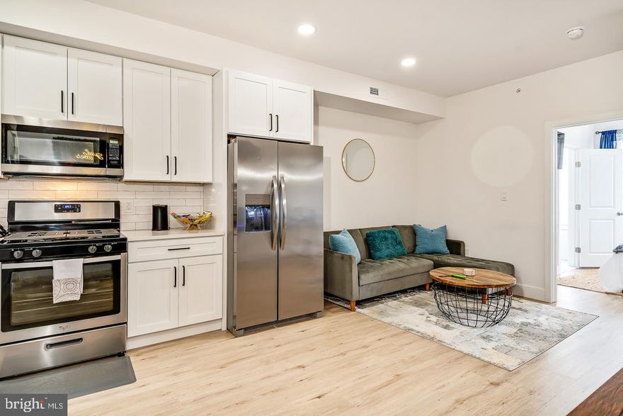 Offering a 1% Rate Buy-down for the first year at NO COST TO THE Buyer, if Buyer uses preferred lender with Movement Mortgage! ALSO, inquire about the assumable FHA loan at 5%!

Newly built Triplex (2022) in the booming Brewerytown neighborhood, an excellent investment opportunity with increasing rental amounts YOY, with 8 years left on the full-10y Tax Abatement! The modern, sleek finishes throughout create a bright and inviting atmosphere, perfect for both relaxing and entertaining. Enjoy the fresh, clean aesthetic with neutral tones that complement any decor style.

The first-floor features a 3-bedroom, 3.5-bathroom bi-level unit with a private backyard. Just freshly painted and floors refinished, this unit is now vacant and could be perfect for an owner-occupant OR it can be rented at $2,000/month.

Unit 2 features 2-bedrooms, 2-bathrooms and is currently leased at $1,450/ month.

The third-floor, featuring 2-bedrooms, 2-bathrooms, is being utilized as a short-term rental, averaging $2,500/ month. The roof top deck adds an extra layer of luxury to the 3rd floor unit, capturing amazing city views. Could be long-term leased at $1,550-$1,600/ month.

All units have washer/dryers in unit.

Located mid-way between Center City and Temple University and just east of Brewerytown, this triplex is located in quite an up-and-coming area.