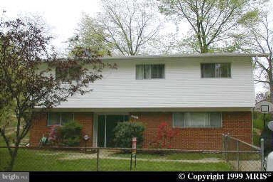 Charming split foyer, with 4 bedrooms, 2 full baths, hardwood floors through out, remodeled kitchen open space for entertaining and large back yard.