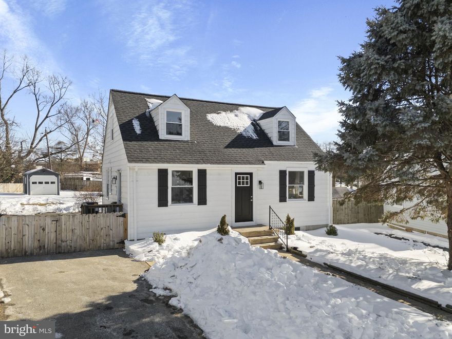 This charming Cape Cod packs a big punch on the inside and out!!!  It has been thoughtfully reconfigured and immaculately updated from roof to basement.  Every square foot has been strategically utilized to maximize enjoyment and long-term love of home.  Stop moving and start loving where you live!!  When you arrive, you will be in awe of the curb appeal and notice the boastful 0.27-acre backyard which features two outbuildings for all your gadgets and gizmos or workshop space and plenty of open space for lawn games and toys.  The driveway accommodates up to three vehicles, ensuring convenience for you and your guests.  You'll already be in love with this home and you haven't even entered the inside!!  Crossing the threshold, you will pleasantly find four spacious bedrooms and two full bathrooms, ensuring ample space for relaxation and privacy, along with Luxury Vinyl Plank (LVP) flooring throughout the main and first floors and upgraded plush carpeting in the fully-finished basement.  The main level invites you to the Owner’s Suite, two bathrooms, living room and eat-in kitchen.  The Owner's Suite is truly a place of serenity, complete with large windows providing immense natural light and sweeping views of the backyard, a large walk-in closet and a luxurious en-suite bathroom with glass-enclosed shower and double-sink vanity.  Both the Owner’s Suite bathroom and the second bathroom have been designed with luxury in mind and include tiled floors, tiled tub/shower walls extending to the ceiling, and large vanities.  At the heart of the home is the perfectly-sized living room/dining room combo to unwind after a long, hard day of work or a perfect space to host all the Instagram worthy gatherings.  This lies just off the eat-in kitchen which is packed with brag-worthy stainless-steel appliances, quartz countertops and an eat-in bar top that triples as additional storage underneath and additional countertop to make meal prep and entertaining a breeze.  Traveling upstairs to the second level, you will find two well-appointed bedrooms, one with a walk-in closet!  There is also a flexible space to dedicate as a kid play area, homework lounge or even a home-office.  Last, but certainly not least, venture downstairs to the fully-finished, walk-out basement to find the 4th large bedroom, the laundry/mud room and the extensive open area which offers versatility for entertaining, home gym, home office or whatever your heart may desire.  This house is not just a home; it is where memories will be made!!