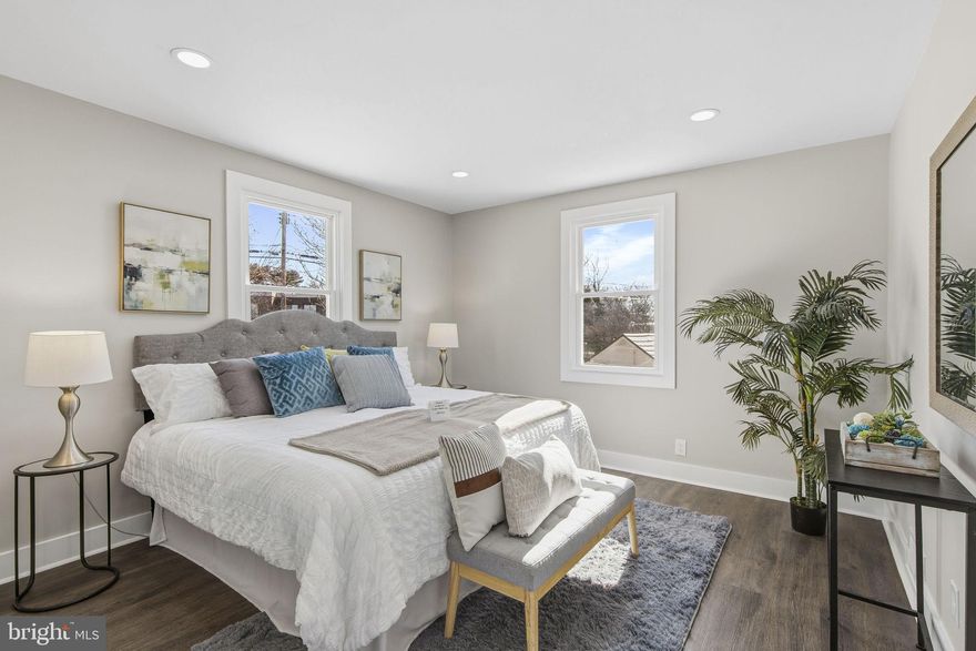 This charming Cape Cod packs a big punch on the inside and out!!!  It has been thoughtfully reconfigured and immaculately updated from roof to basement.  Every square foot has been strategically utilized to maximize enjoyment and long-term love of home.  Stop moving and start loving where you live!!  When you arrive, you will be in awe of the curb appeal and notice the boastful 0.27-acre backyard which features two outbuildings for all your gadgets and gizmos or workshop space and plenty of open space for lawn games and toys.  The driveway accommodates up to three vehicles, ensuring convenience for you and your guests.  You'll already be in love with this home and you haven't even entered the inside!!  Crossing the threshold, you will pleasantly find four spacious bedrooms and two full bathrooms, ensuring ample space for relaxation and privacy, along with Luxury Vinyl Plank (LVP) flooring throughout the main and first floors and upgraded plush carpeting in the fully-finished basement.  The main level invites you to the Owner’s Suite, two bathrooms, living room and eat-in kitchen.  The Owner's Suite is truly a place of serenity, complete with large windows providing immense natural light and sweeping views of the backyard, a large walk-in closet and a luxurious en-suite bathroom with glass-enclosed shower and double-sink vanity.  Both the Owner’s Suite bathroom and the second bathroom have been designed with luxury in mind and include tiled floors, tiled tub/shower walls extending to the ceiling, and large vanities.  At the heart of the home is the perfectly-sized living room/dining room combo to unwind after a long, hard day of work or a perfect space to host all the Instagram worthy gatherings.  This lies just off the eat-in kitchen which is packed with brag-worthy stainless-steel appliances, quartz countertops and an eat-in bar top that triples as additional storage underneath and additional countertop to make meal prep and entertaining a breeze.  Traveling upstairs to the second level, you will find two well-appointed bedrooms, one with a walk-in closet!  There is also a flexible space to dedicate as a kid play area, homework lounge or even a home-office.  Last, but certainly not least, venture downstairs to the fully-finished, walk-out basement to find the 4th large bedroom, the laundry/mud room and the extensive open area which offers versatility for entertaining, home gym, home office or whatever your heart may desire.  This house is not just a home; it is where memories will be made!!