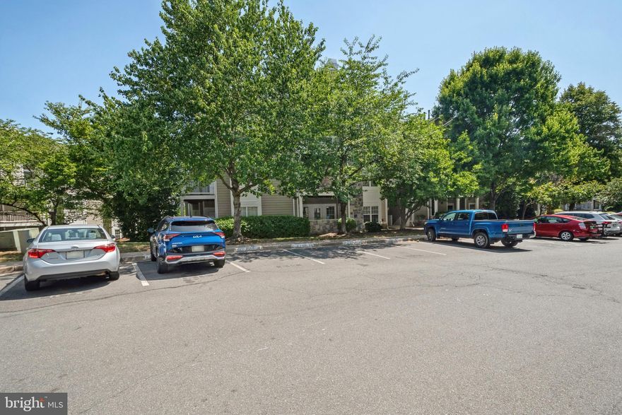 Main level condo unit with lots of updates.  New Luxury Vinyl Plank flooring, fresh neutral paint, new white kitchen cabinetry, new stainless appliances and new Quartz counters.  Remodeled primary bath with oversized walk in shower, double sinks and Quartz counters.  Primary suite with walk in closet. Living room with gas fireplace, built ins and access to a covered balcony.  Laundry with full size washer dryer with additional shelving space.  Community amenities include a pool, fitness center, club house, tennis courts, walking trails, car wash area and more. Walk to Reston Hospital, Trader Joes, Harris Teeter and the Reston Town Center.  Close to commuter routes - Fairfax County Parkway and the Dulles Toll Road as well as Metro.