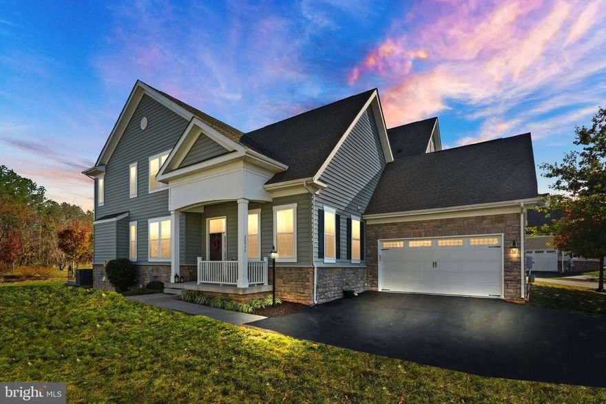 Welcome to 20950 Goose Preserve Drive—an Ashburn carriage house featuring a main-level primary suite, an airy open layout, and a peaceful, private setting backing to a common area. Enjoy the everyday ease of main-level primary bedroom living, a layout many buyers love for long-term comfort, within a vibrant neighborhood of all ages.

The heart of the home is the dramatic two-story family room, filled with natural light and perfectly suited for everyday living and effortless entertaining. Upstairs, a spacious loft offers flexible bonus space and includes a built-in office desk/workstation, perfect for working from home, homework, or a convenient command center. With 4 bedrooms, 4 full bathrooms, and 1 powder room, there’s plenty of room for everyone to spread out comfortably.

The lower level adds even more living space with a large recreation room, plus a generous unfinished storage room making it ideal for seasonal items, hobbies, or future expansion potential.

Come experience the space, light, and privacy that make Goose Preserve Drive feel like home.