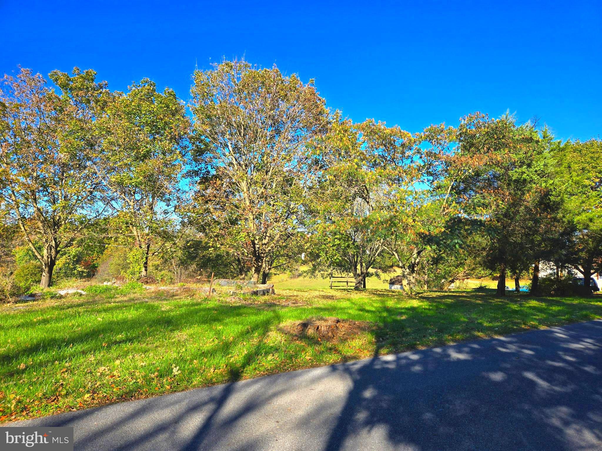 COME LIVE THE COUNTRY LIFE, BUT ONLY 5 MINUTES FROM THE CITY! Situated on slightly more than one very green acre, yet located just a very short drive from modern conveniences, grocery stores, shopping, restaurants, and Interstate 81, this lot can be transformed into your rural oasis, eliminating the need to spend substantial additional time commuting daily. Sizable, livestock-friendly properties such as this do not commonly offer high-speed internet, but if your interests include both having cattle and having Comcast, then come make this your homeplace! Deer and turkey are abundant here, as well. Power already passes over the property. The seller says the soil is very rich and has produced excellent garden yields over the past several decades. The property has a large level area at the road frontage, then has a pleasantly gentle slope at the back. This could potentially be a perfect lot for a house with a walkout basement. Schedule an appointment to see this property today! IF YOU LIKE WHAT YOU SEE, CALL !!!!!!