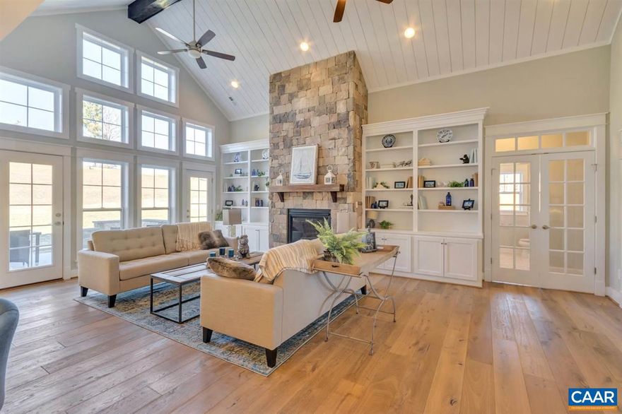 New Construction on 8 acres of wooded privacy located less than 10 miles from UVA and the Downtown Mall near the Rivanna River! Finished Basement Rec Room, Bedroom and Bathroom Included! This 'Newport' plan offers an open floor plan with three main level bedrooms, including spacious owner's suite, dedicated study, a stunning Great Room that boasts a cathedral ceiling and tons of windows to maximize natural light. Quality built 2x6 exterior walls, custom mahogany front door, R-19 insulation, and Trex Deck. Kitchen includes painted maple cabinetry (white, gray, etc. shaker style), granite countertops (also in owner's suite), and much more. Photos are of previously built model home. New Construction with no construction loan needed-- with deposit Builder will fund the build so that purchaser may obtain the same type of loan as if they bought a resale.  Builder also offers a streamlined process to make planning your move easy with a known move in date upfront.,Granite Counter,Maple Cabinets,Wood Cabinets,Fireplace in Basement,Fireplace in Family Room,Fireplace in Great Room