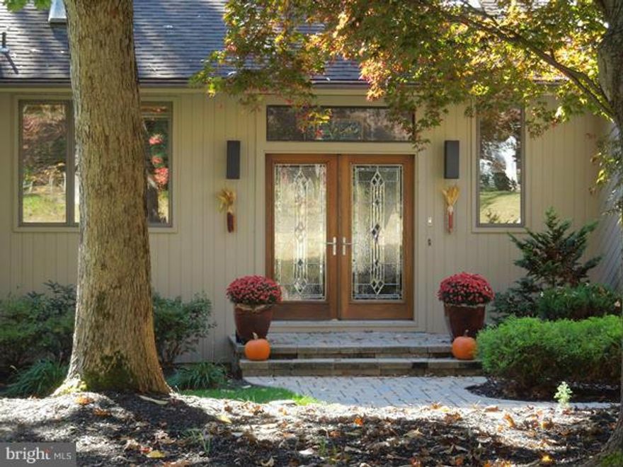 Fabulous custom waterfront, featuring a great room concept with views and deck access from all main rooms. First floor master suite. Renovated kitchen & baths with cherry cabinets and granite. Level walk out to 90' pier with 4-5' M.L.W., sundeck and boatlift.  Whole house generator, gas heat. Walk to clubhouse, pool & tennis.  Vaulted ceilings, open, light and pristine. Hurry!