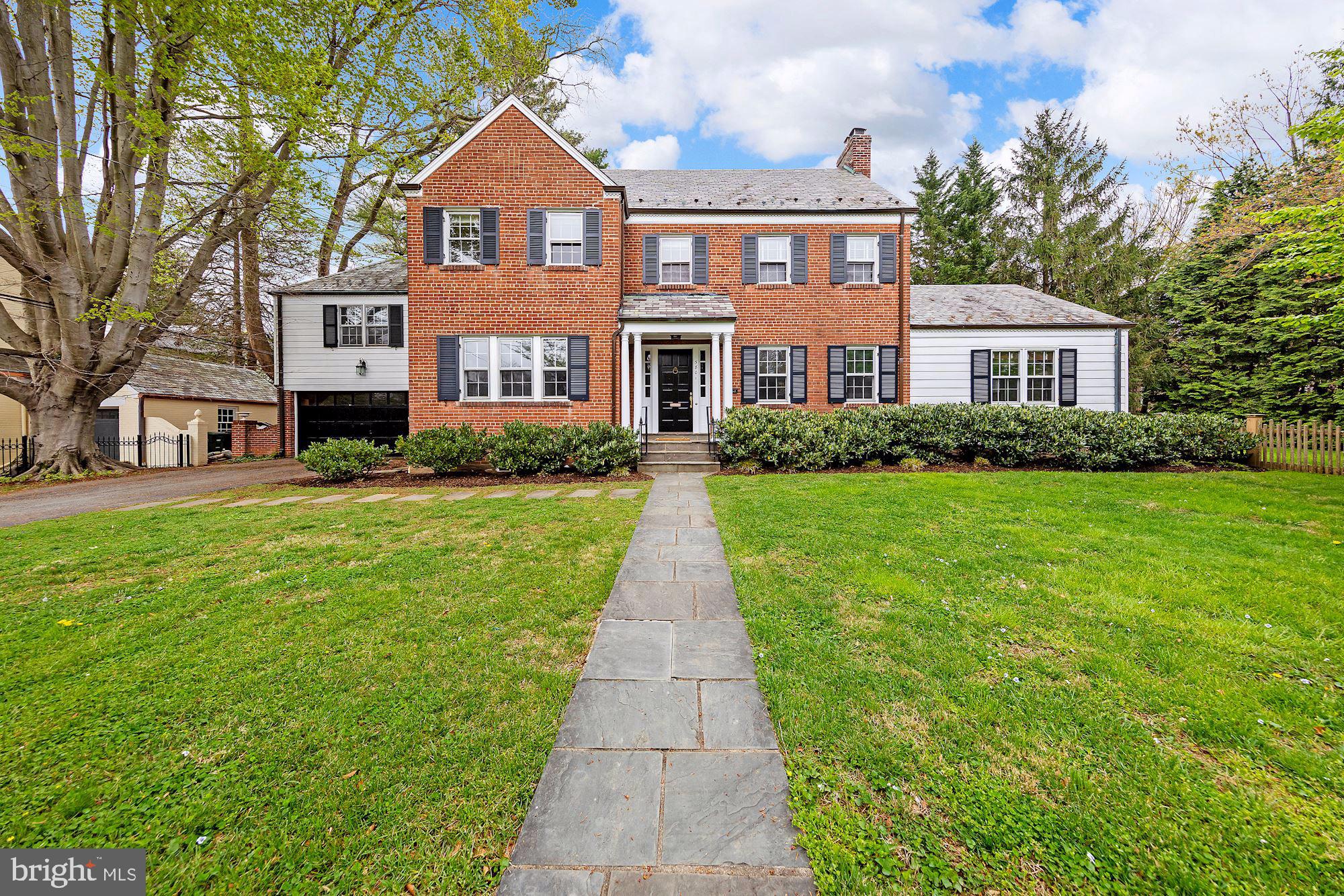 Lovely Colonial in sought after Chevy Chase Village! Originally built in 1936 and has been updated over the years. This 4,500 square foot home features four finished levels including a main level with chef’s kitchen open to the Dining room, formal Living room w/dual fireplace opening into a sun-filled Family room w/vaulted ceiling, bay window, built-in cabinetry and French doors leading to patio, Den with full bath, The second level features a beautiful Owner suite complete with  two walk-in closets , and private en-suite bath with large shower, ample storage and dual vanity! Plus 3 additional Bedrooms ( one with en-suite Bath) and a hall Bath. An additional 2 Bedrooms OR Bedroom & playroom, are found on the third level. The lower level features a Recreation room with wet bar, half bath, spacious storage room with laundry area, and access to the rear yard. Exterior amenities include an outdoor patio, Lovey garden, one car Garage, and ample driveway parking. Owner reserves the right to accept / reject any offer.