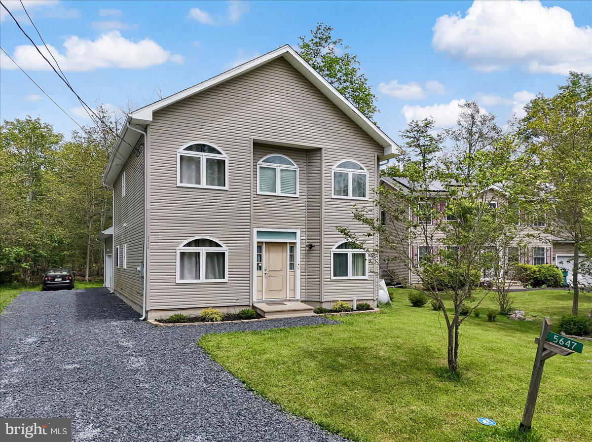 Welcome to this stunning, modern 4 bedroom, 3 bath beauty! Located in a picturesque, amenity filled and sought-after neighborhood in the heart of the Poconos. The well-equipped kitchen boasts modern finishes and ample storage and with over 2,200' of living space, that makes this home a perfect blend of modern luxury and comfort! With a 2-car garage, and a paved driveway, this home provides everything you need for everyday living. Step outside to enjoy all the community has to offer - the lake, the pools, the wildlife, the serene settings where you can unwind and enjoy the fresh mountain air. Don't miss the opportunity to own this beautiful home. STR friendly!
