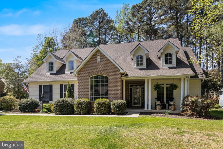 3% VA Assumble loan available!  This stunning five-bedroom, four-bath home offers exceptional space, thoughtful design, and luxury finishes throughout—perfect for a growing or multi-generational household. Featuring two separate primary suites, and an ensuite the layout provides both flexibility and privacy for a growing family.
The main level includes a spacious primary suite along with three additional bedrooms, one of which can easily function as a den or fifth bedroom. The open-concept design showcases a beautifully appointed kitchen with granite countertops, stainless steel appliances, and seamless flow into the main living areas—ideal for everyday living and entertaining. Every detail has been carefully considered, and the quality craftsmanship is evident throughout.
The main-level primary suite is a true retreat, featuring a spa-inspired bath, an oversized shower with multiple shower heads, and a connecting walk-in closet. Upstairs, you’ll find a second expansive primary bedroom with its own full private bath, perfect for guests or extended family.
Additional highlights include an attached two-car garage, ample walk in attic storage, New HVAC system and hot water heater, and exceptional outdoor living spaces. Enjoy the covered porch with ceiling fans, a newly added deck, and a paver patio that provides a generous area for entertaining and relaxing outdoors.
Located in the sought-after Swan Point Yacht & Country Club, residents enjoy access to a top-rated 18-hole golf course, clubhouse with restaurant and pro shop, community swimming pool, tennis and basketball courts, as well as a marina and boat ramp.