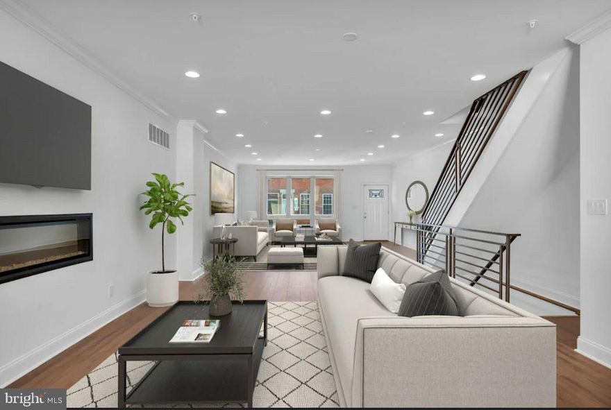 Discover unparalleled luxury in this exceptional New Construction townhome – a true masterpiece in the heart of the city complete with 5 bedrooms, 3 full bathrooms, 2 half baths, and a FULL 10-Year Tax Abatement! ASK ABOUT OUR EXCLUSIVE LENDER CREDIT.   With an expansive 4,500 square feet, this modern marvel offers custom-designed finishes, a smart security system with cameras, two separate high efficiency HVAC systems, and breathtaking views of Center City. Boasting 20 feet in width and 56 feet in length across 3 stories, including a rooftop deck and fully finished basement, this residence redefines urban living. The open first floor welcomes you with a chic kitchen, a 10-foot center island, a fireplace, and a living space that seamlessly connects to a 20-foot backyard oasis, perfect for entertaining. Continue to the second floor, where three spacious bedrooms, a full bathroom, and a balcony await. The third floor unveils an oversized master suite with a lavish bathroom and an expansive walk-in closet. Step into a sprawling lounge area with a built-in fireplace – an entertainer's dream. The rooftop deck offers 1,120 square feet of panoramic city views. The basement features a fifth bedroom, full bathroom, utility room, and a generously sized space that adapts to your lifestyle – be it a guest suite, gym, or a recreation room.    PRIME LOCATION! Conveniently located near premier shopping destinations, with plenty attractions within walking distance, making it a sanctuary of luxury living in the midst of urban vibrancy.