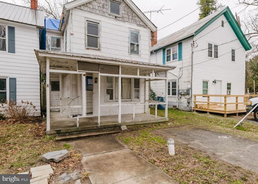 Built in 1910, this two story home offers approximately 1166 finished square feet, three bedrooms and one full bath, hardwood floors and covered front porch. This home sits on an approximate 5018 sqft lot and is in need of some TLC.