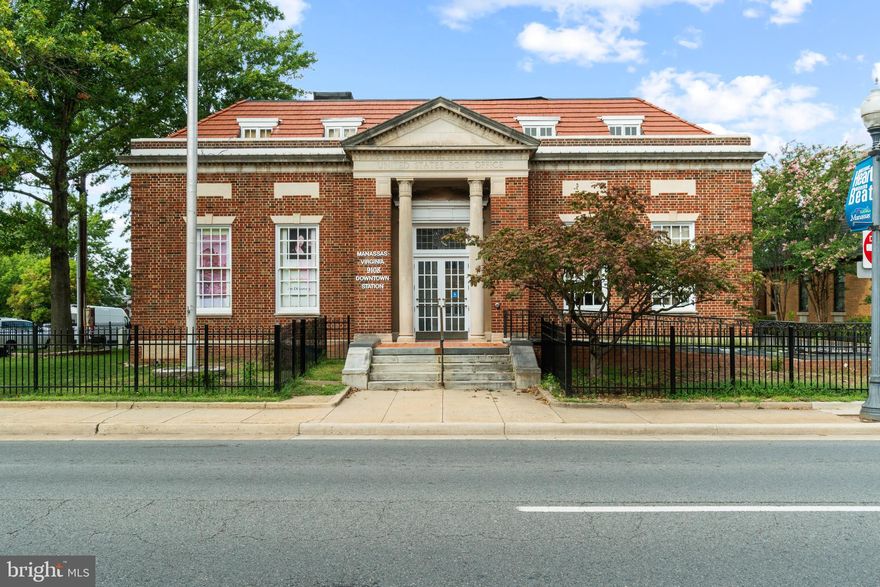 Main floor plus one connecting office space upstairs in this historic Old Town Manassas building is available for rent. Great business opportunity in Historic Manassas.  The upper and lower level is also available for an additional cost.  ** The post office occupies the right side of the building.