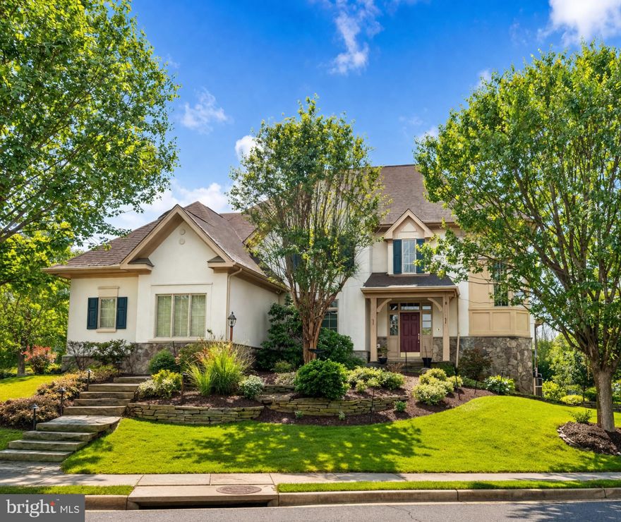 Stunning stucco and stone-front colonial located in the highly sought-after Carrington community in Vienna, VA. This spacious 6-bedroom, 5.5-bath home offers close to 7,000 square feet of living space and a fully finished daylight walkout basement, providing the perfect blend of luxury, functionality, and comfort.

The main level features a bright and open floor plan with hardwood flooring, multiple living and entertaining spaces, and a seamless flow throughout. The gourmet kitchen opens to a large family room, creating an ideal layout for everyday living and hosting. With four fireplaces throughout the home, you’ll enjoy warmth and character in multiple living areas.

Upstairs, the expansive primary suite is complemented by generously sized secondary bedrooms, while the additional full bathrooms provide convenience for family and guests. The fully finished walkout basement offers additional living space, perfect for a recreation room, home gym, or guest suite.

Situated on a beautifully landscaped 0.28-acre lot with mature trees and professional hardscaping, this home also includes a 3-car attached garage and inviting outdoor space ideal for relaxing or entertaining.

Prime Vienna location just minutes to Tysons Corner, Reston, major commuter routes, shopping, dining, and top-rated Fairfax County schools.