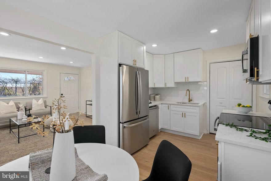 Welcome to your dream home in the heart of Beltsville, where spacious living meets modern style and convenience. This stunning 3-bedroom, 1-bathroom rancher has been thoughtfully reimagined with high-end finishes, offering the perfect blend of elegance and functionality. Upon entry, you're greeted by a bright and airy living room that flows seamlessly into the dining room and designer kitchen, featuring premium stainless steel appliances, custom cabinetry, and striking finishes. Down the hall, you'll find three spacious bedrooms and a beautifully updated hallway bathroom with modern finishes.  Outside, enjoy a large backyard and driveway that provides ample parking. The location can’t be beat with just minutes from Metro for easy access to dining, shops, DC and Baltimore. This is your perfect opportunity to own a move-in-ready home in a quiet, established neighborhood. Schedule your showing today!