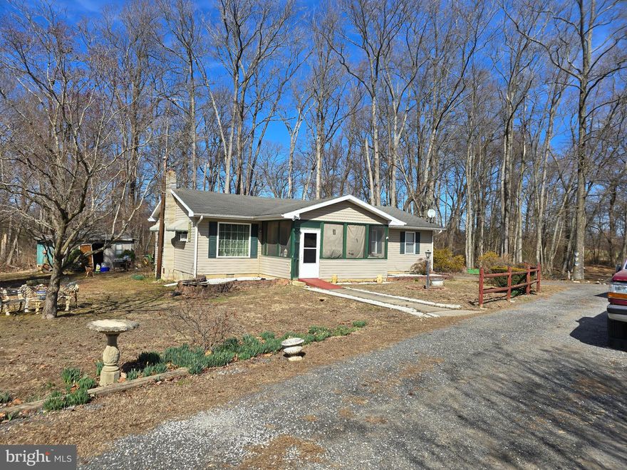 Don't miss out on this great property. This home features 4 bedrooms and 2 full bathrooms all situated on approximately 2.75 acres. Call today for a private showing will not last long.
