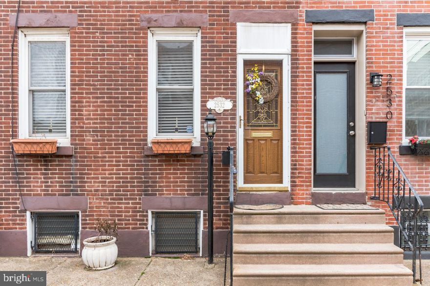 This home offers Tremdous Value in   Port Richmond /Fishtown area  Walk into  beautiful wood floors, crown molding, recessed lighting, ceiling fan and fireplace. Just past the spacious living room and dining area, is a gorgeous kitchen, which has plenty of cabinet and counter space, granite countertops, and  stainless steel appliances and an exposed brick wall.  Heading upstairs you'll find two nice sized bedrooms and a full hall bath. The bathroom is custom tiled and features a deep, jetted tub for ultimate spa like relaxation. The entire home offers wood floors throughout, recessed lighting and ceiling fans.  This home offer tremendous value. All offers will be presented. Ez to show and see